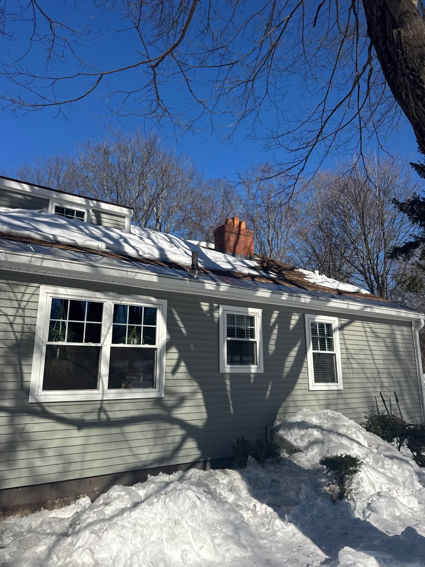 Snow/Ice Belt & Ice Dam Removal Project in Woburn by Mighty Dog Roofing of Greater Middlesex County