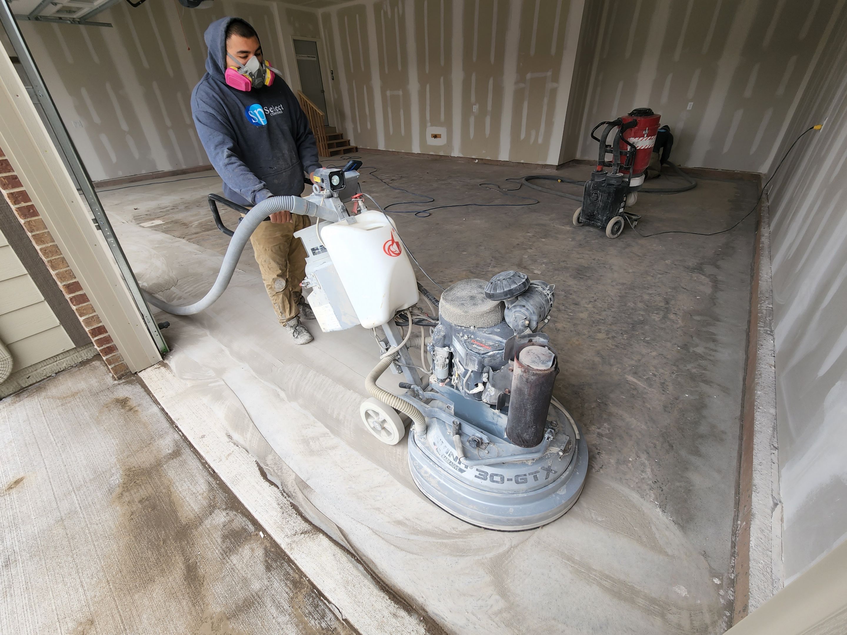 Garage using Mediterranean by Select Painting, Coatings & Garage Cabinets