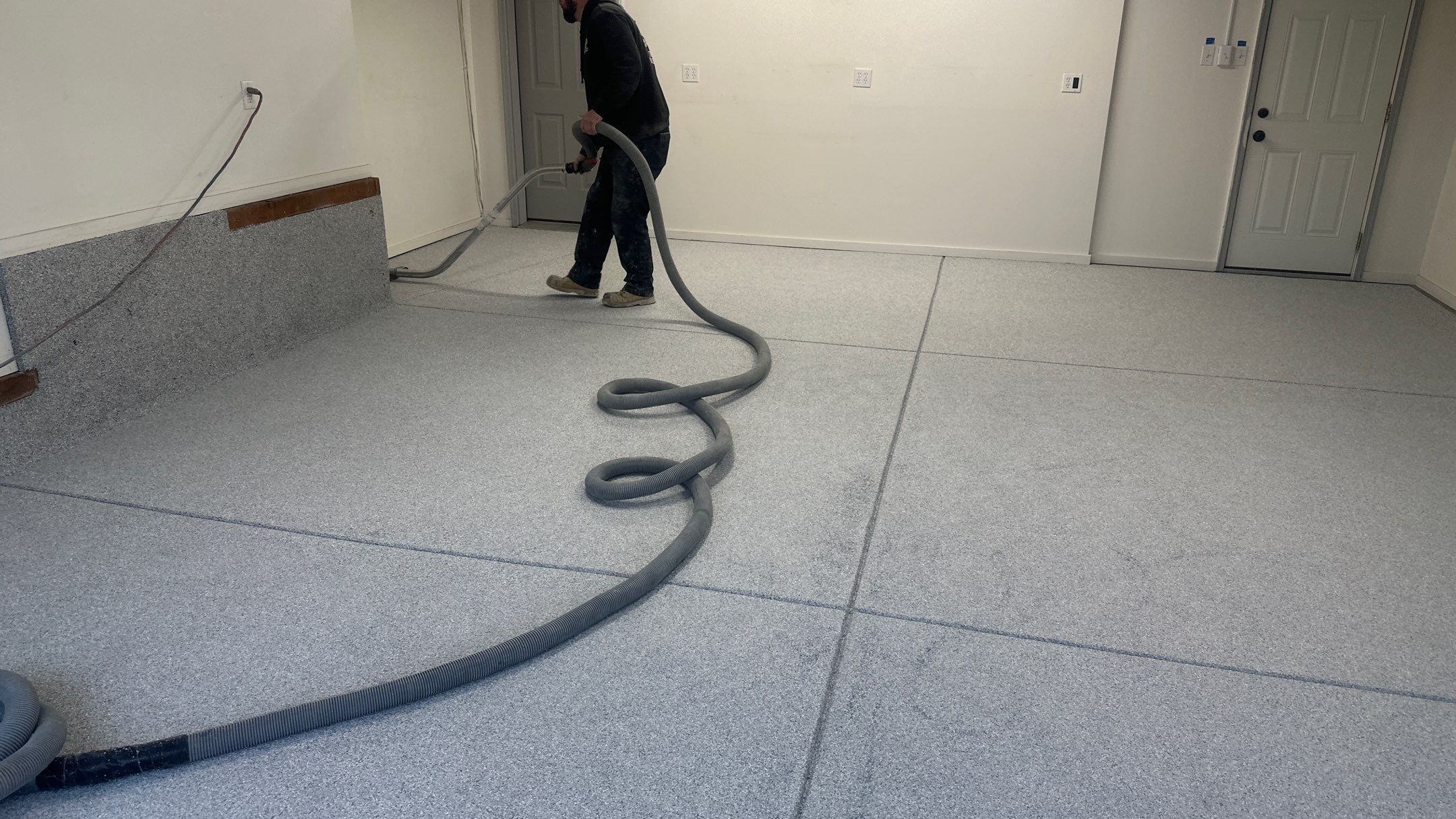 Garage Transformation using 1/8 Tidal Wave by Croc Coatings, LLC