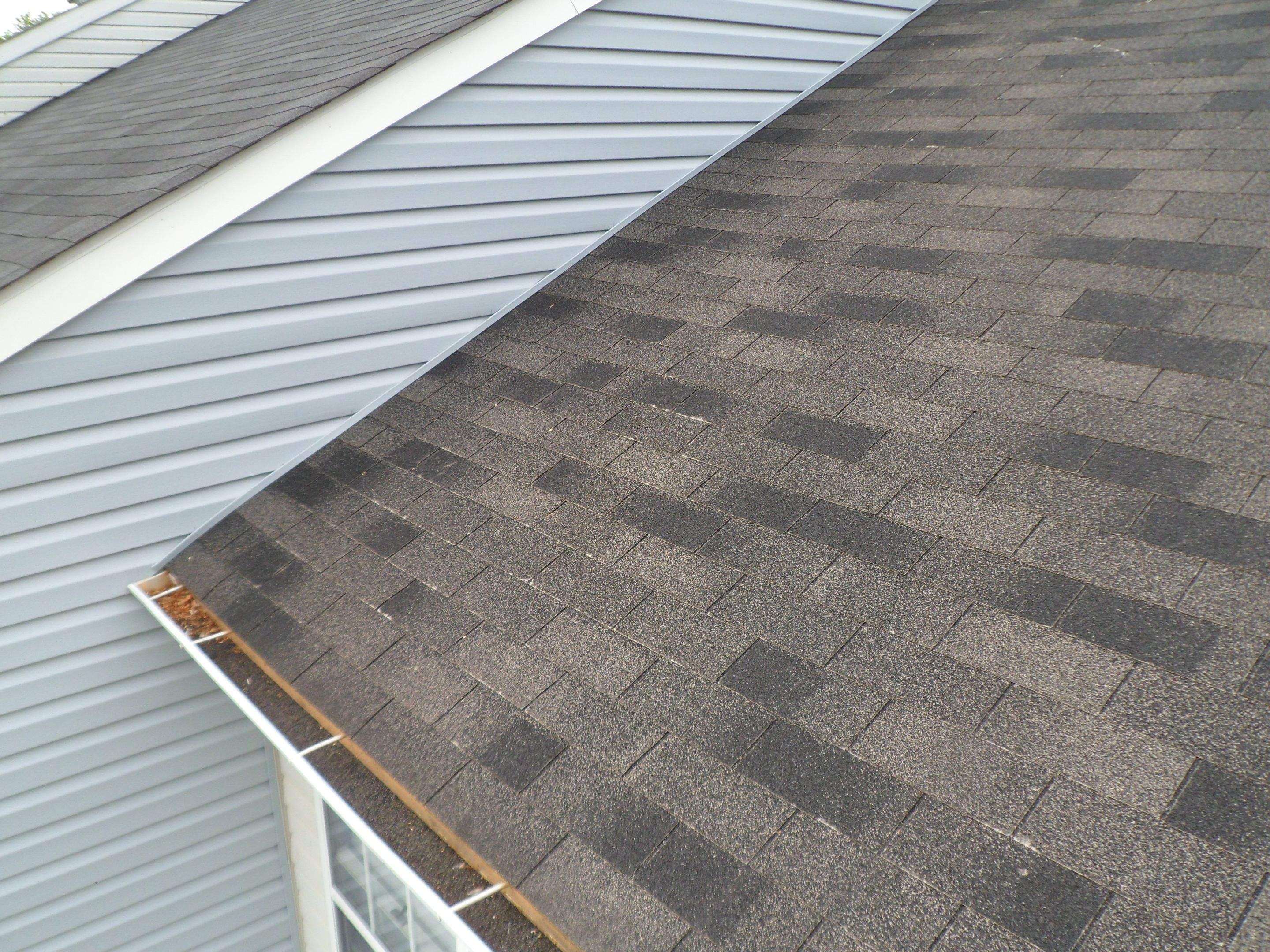 Residential Roofing Installation using XT-25 Color Moire Black by Alpha Design Services