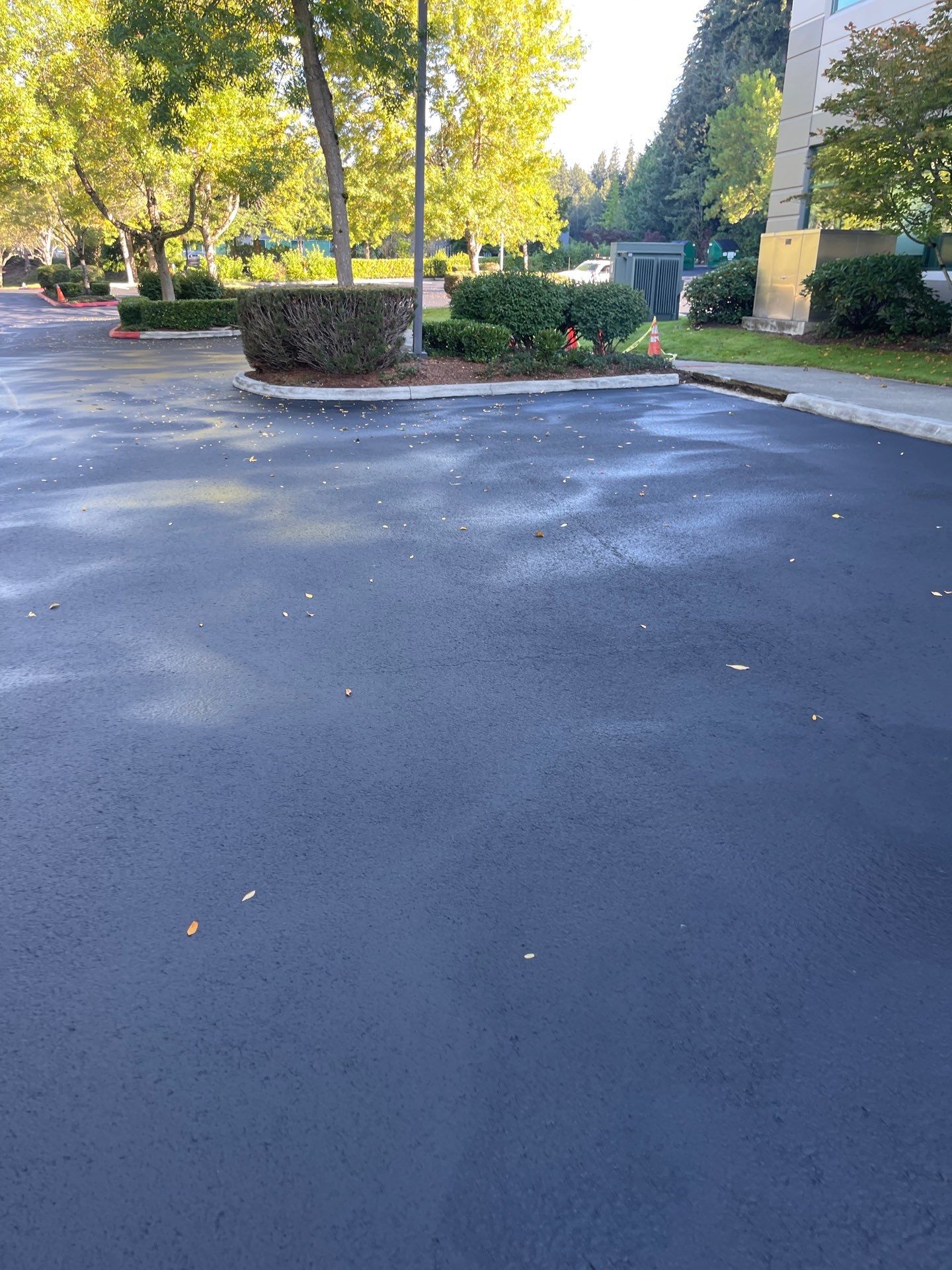Kidder Matthews | Parking Lot Sealcoating & Striping with Concrete Curb & Patch Repairs  by Jireh Asphalt & Concrete Inc 