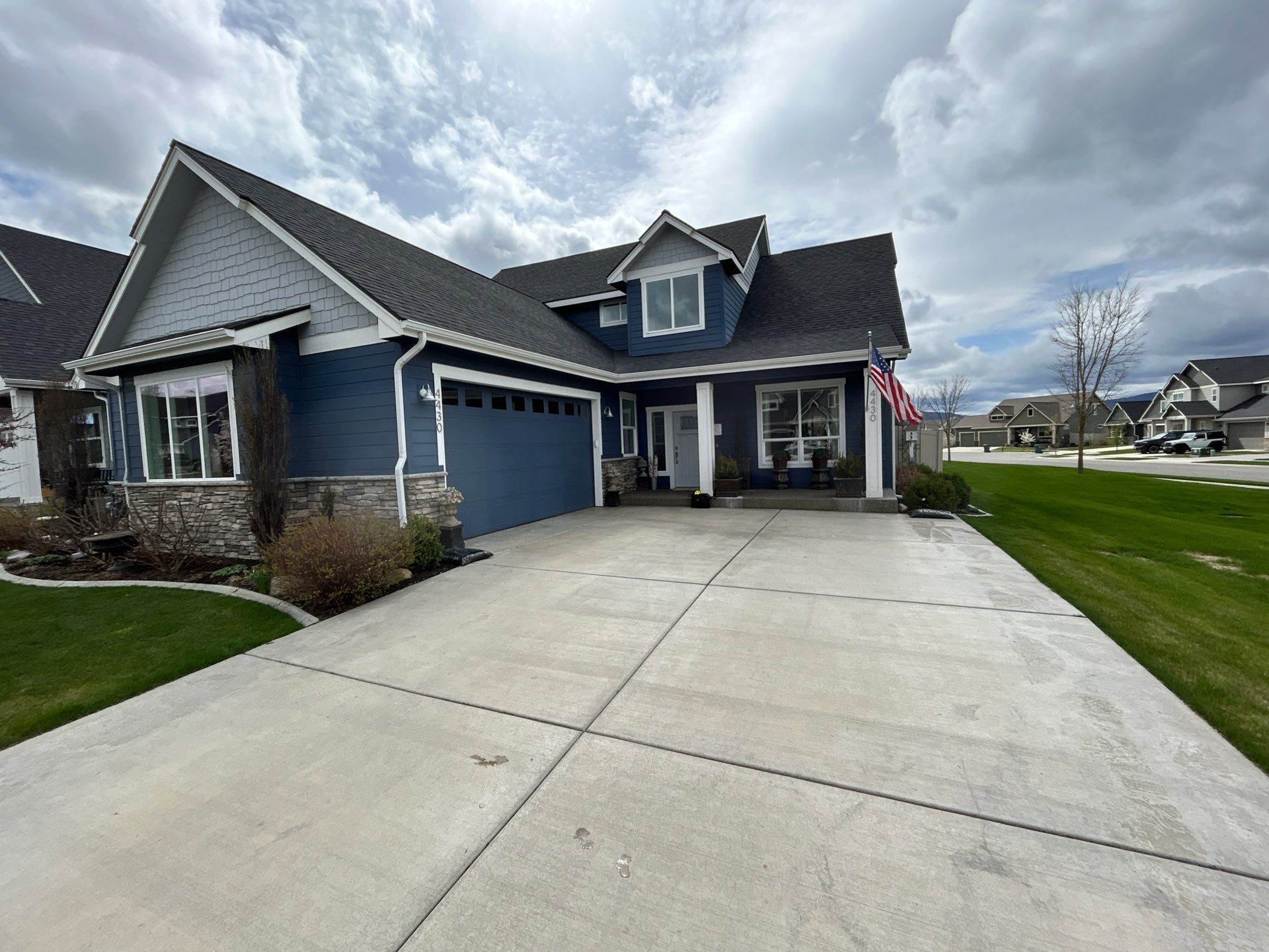 Battleship Hybrid Concrete Coating for Post Falls Patio and Driveway by Croc Coatings, LLC