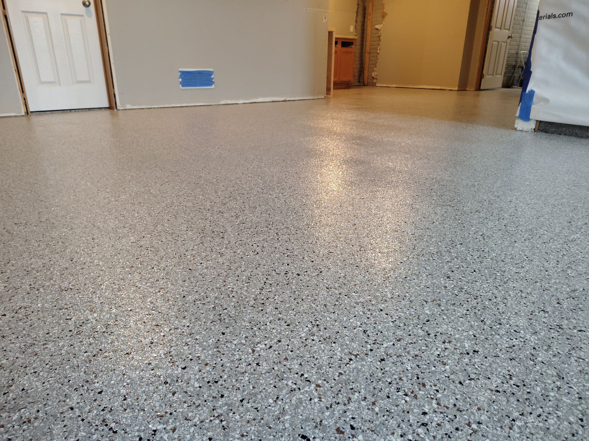 Maxwell, IA Coyote Flake Garage and Basement by Revival Concrete Coatings