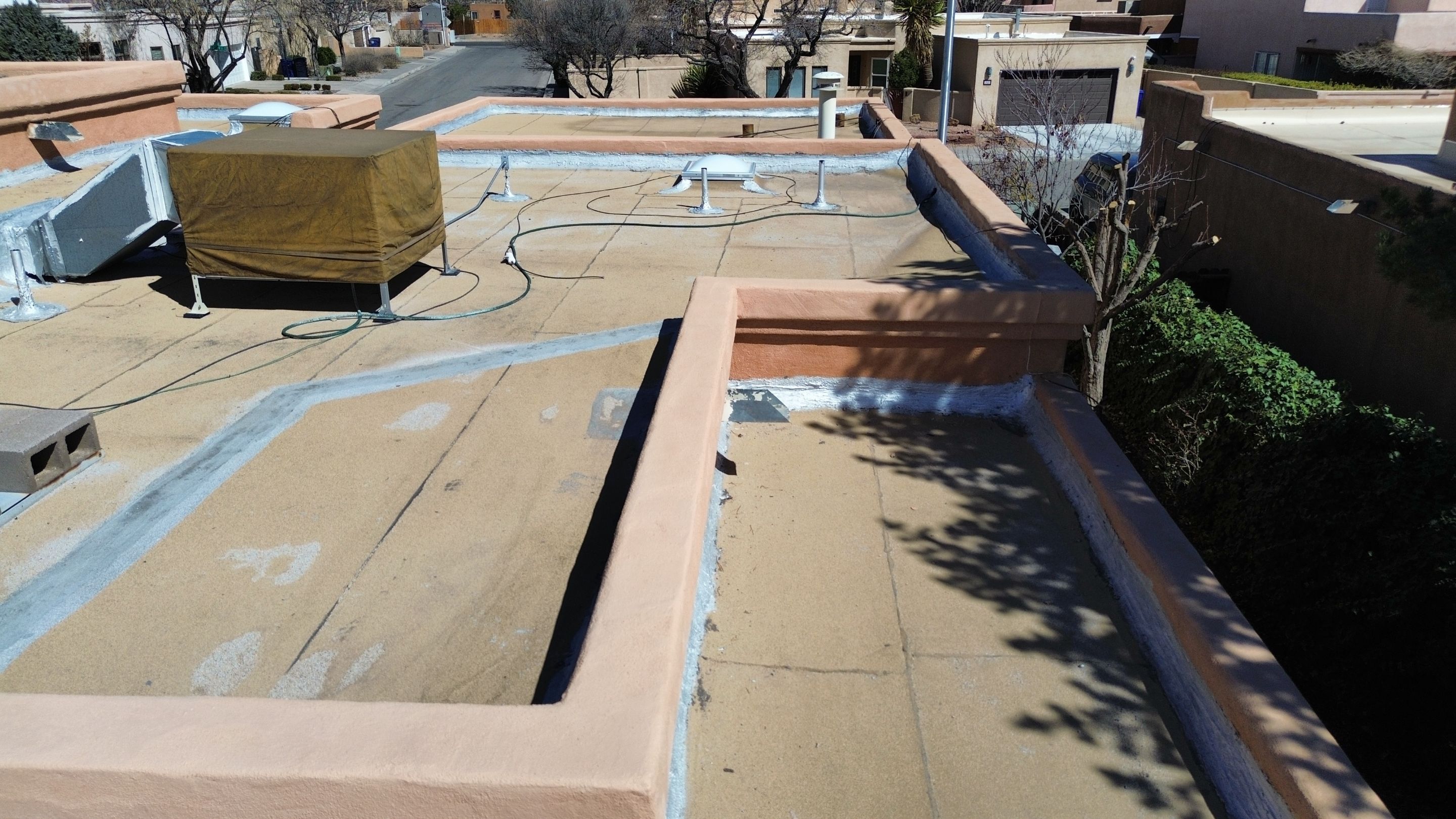 Residential TPO Flat Roof Replacement and Skylight Installation in Albuquerque by Doyle Roof Masters Inc