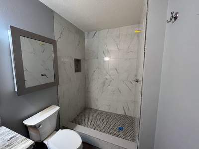 Converting Fiberglass Shower/Tub into Walk in Shower