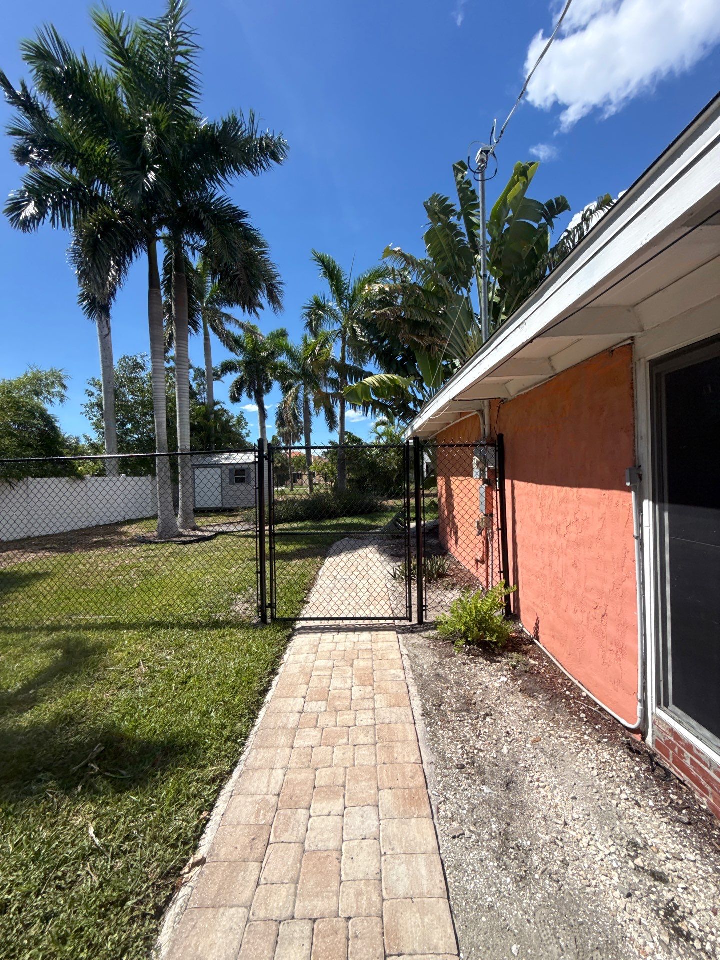 Black Chain Link Fence Installation and Site Clearing in Nokomis by True Fence LLC