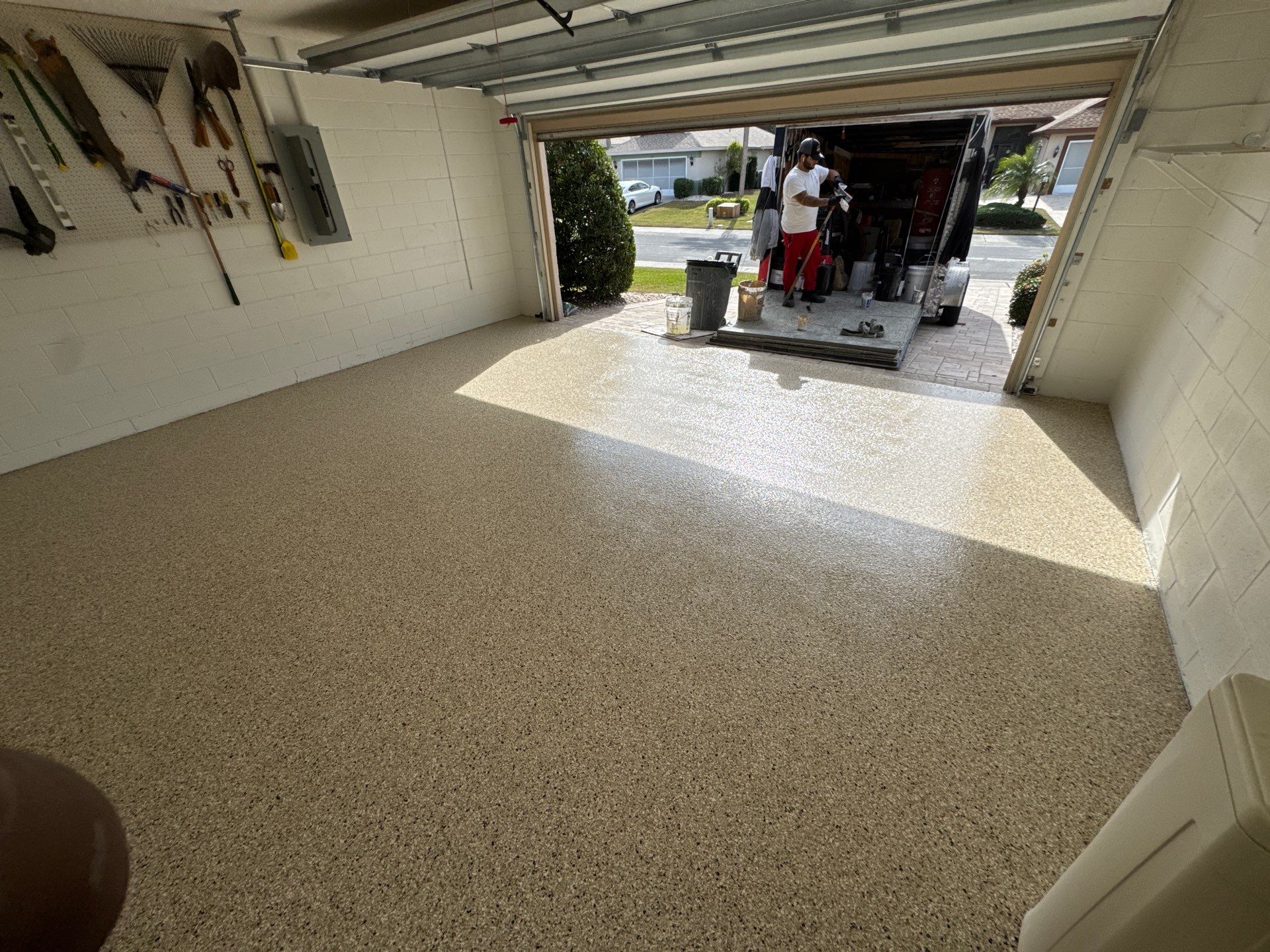 Shoreline Flake Garage with High-End Neutral Tones by Performance Floors & Coating