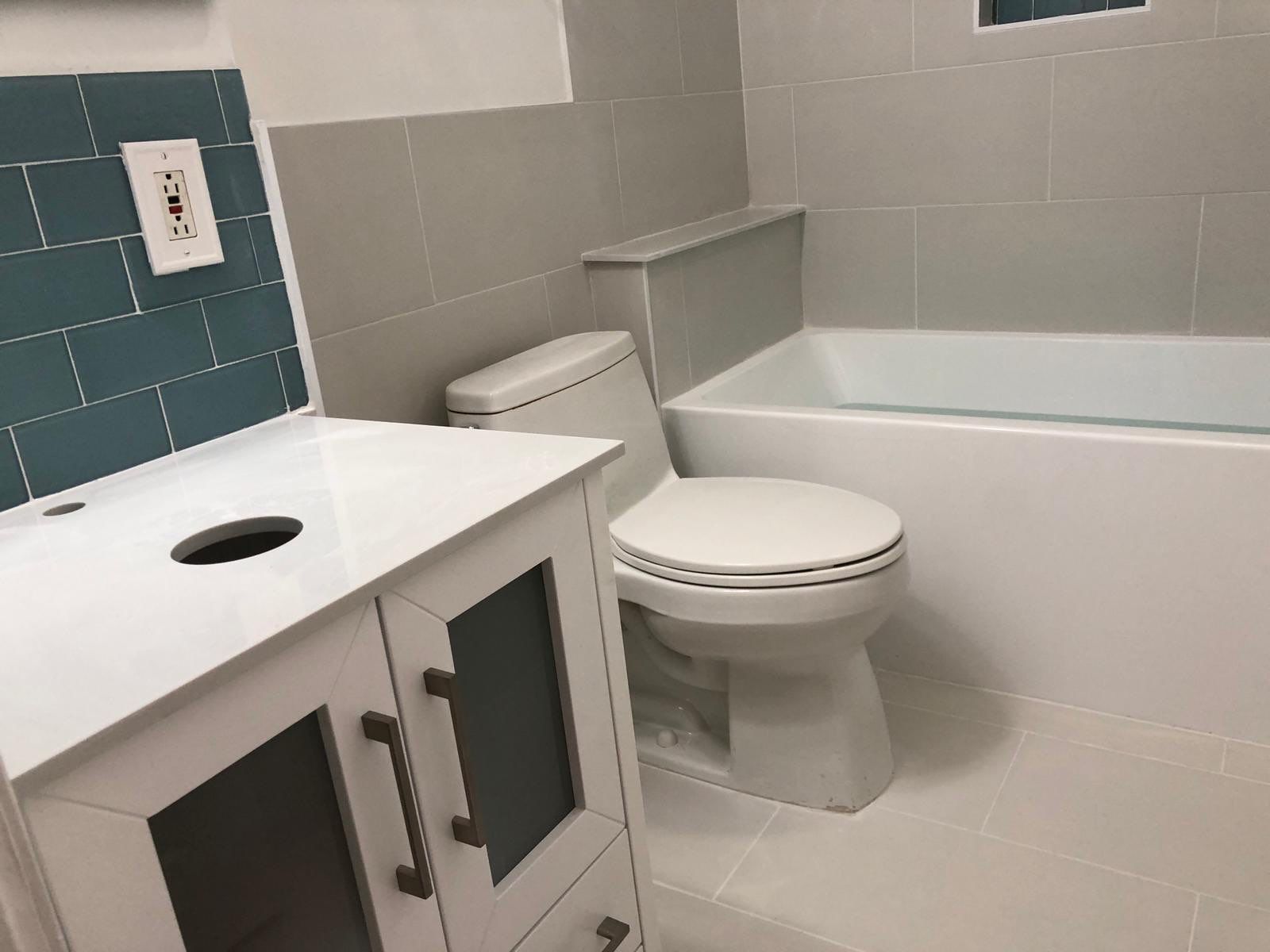 Bathroom Remodel using Tile by Home Concepts Construction