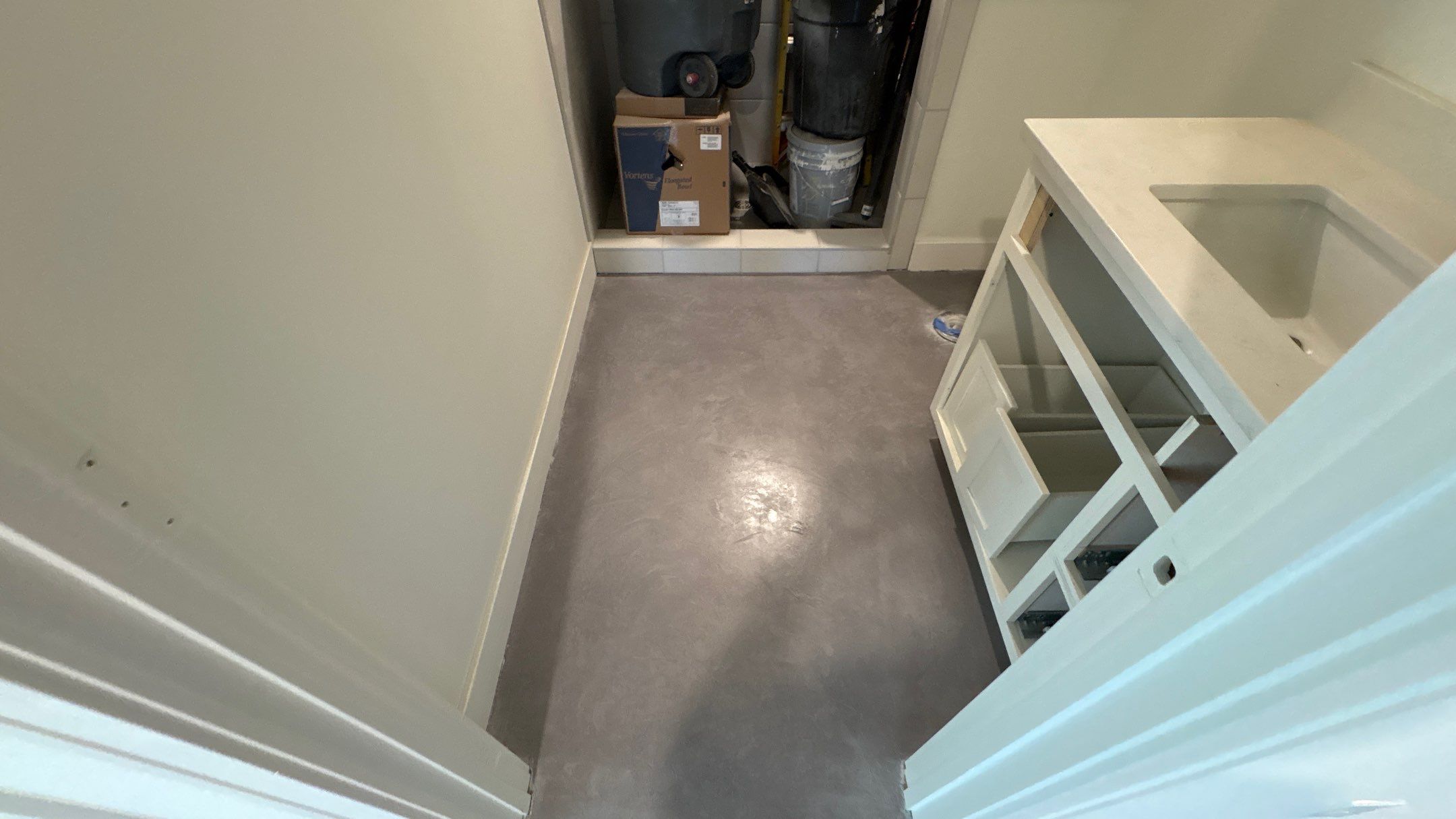 Basement Floor Overlay - Lawrence, KS by Big Red Decorative Concrete, LLC