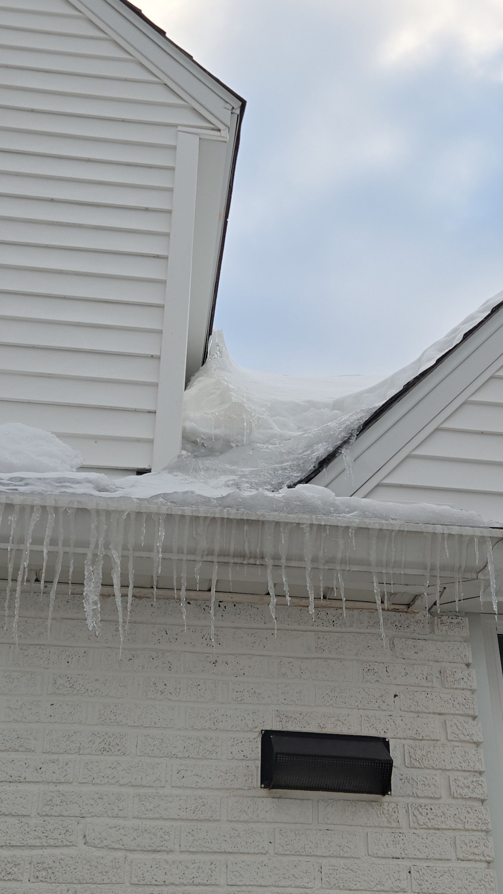Massive Ice Dam Removal by Level Up Roofing and Restoration Services LLC