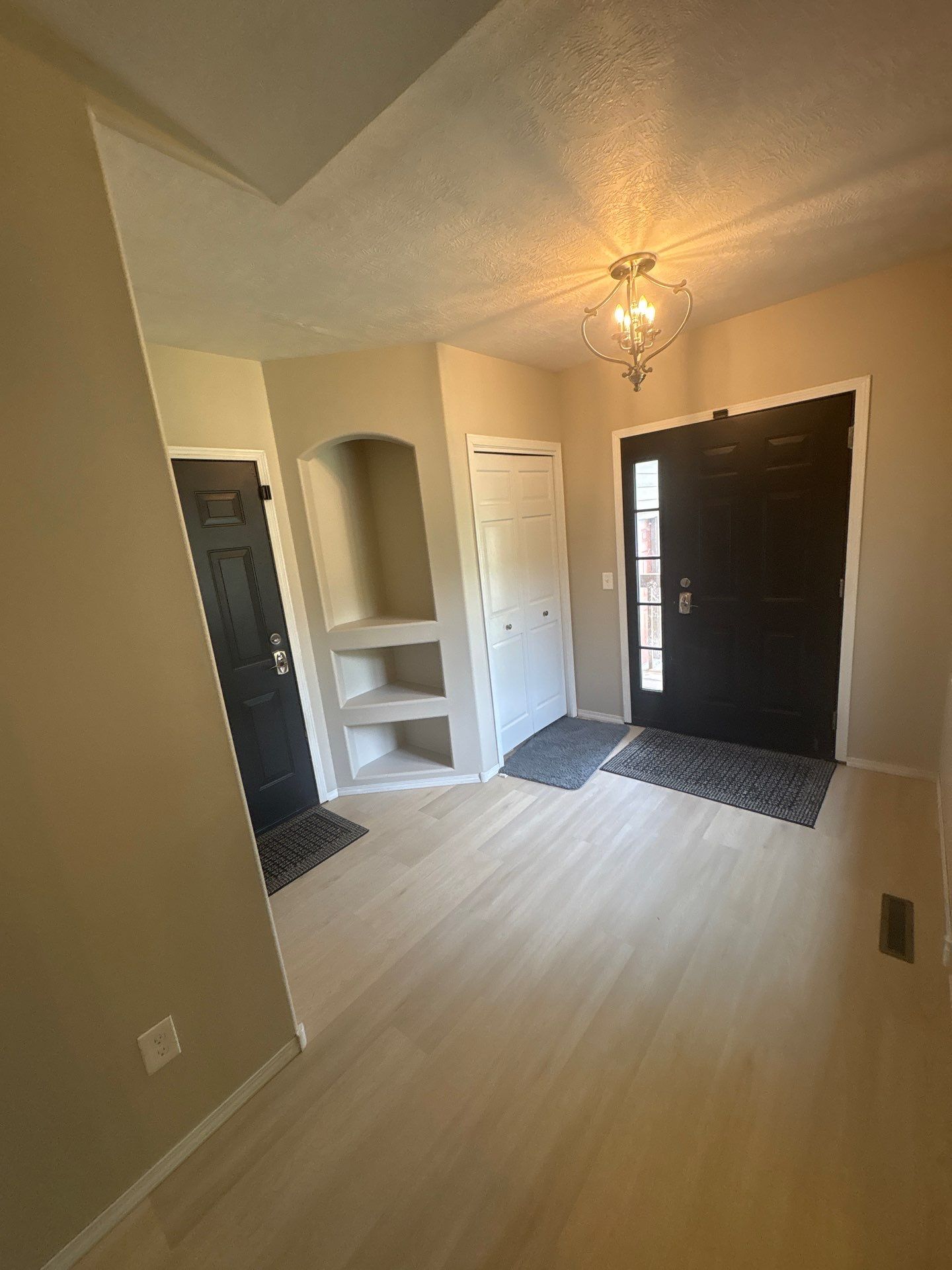 Sioux Falls Interior Painting and Luxury Vinyl Plank Flooring Installation by Select Painting, Coatings & Garage Cabinets