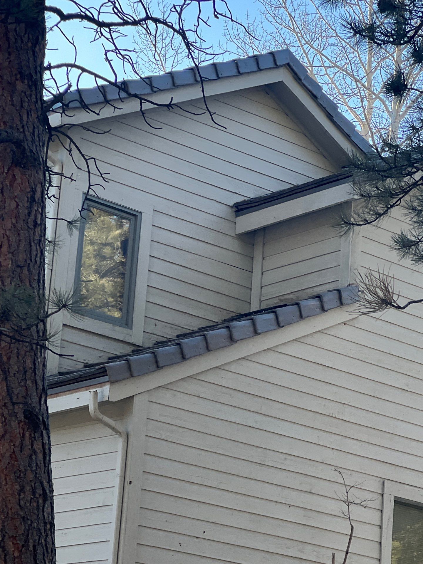 Residential Roofing Installation using Concrete Tile by Blue Peaks Roofing LLC 