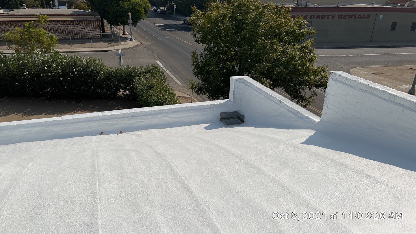 Polyurethane foam roof refurbish and recoating by Straight Edge Roofing Inc