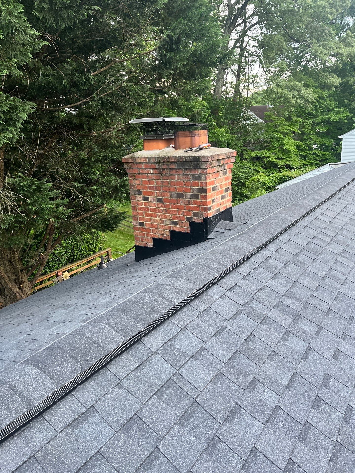 Burke: CertainTeed Landmark Designer Shingles in Moire Black by RM Banning, Inc.