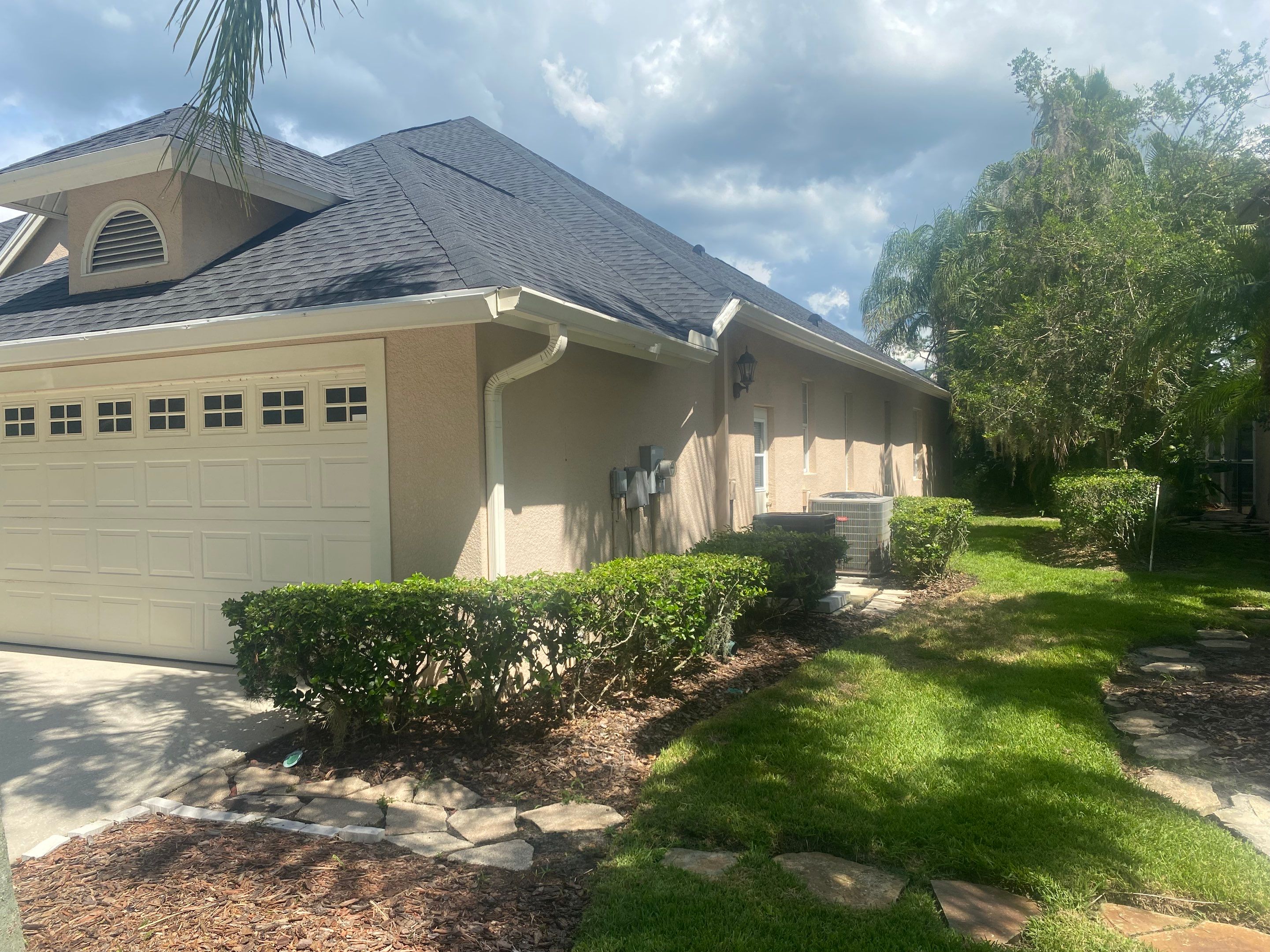 White Gutters and White Downspouts by Gutter Professors