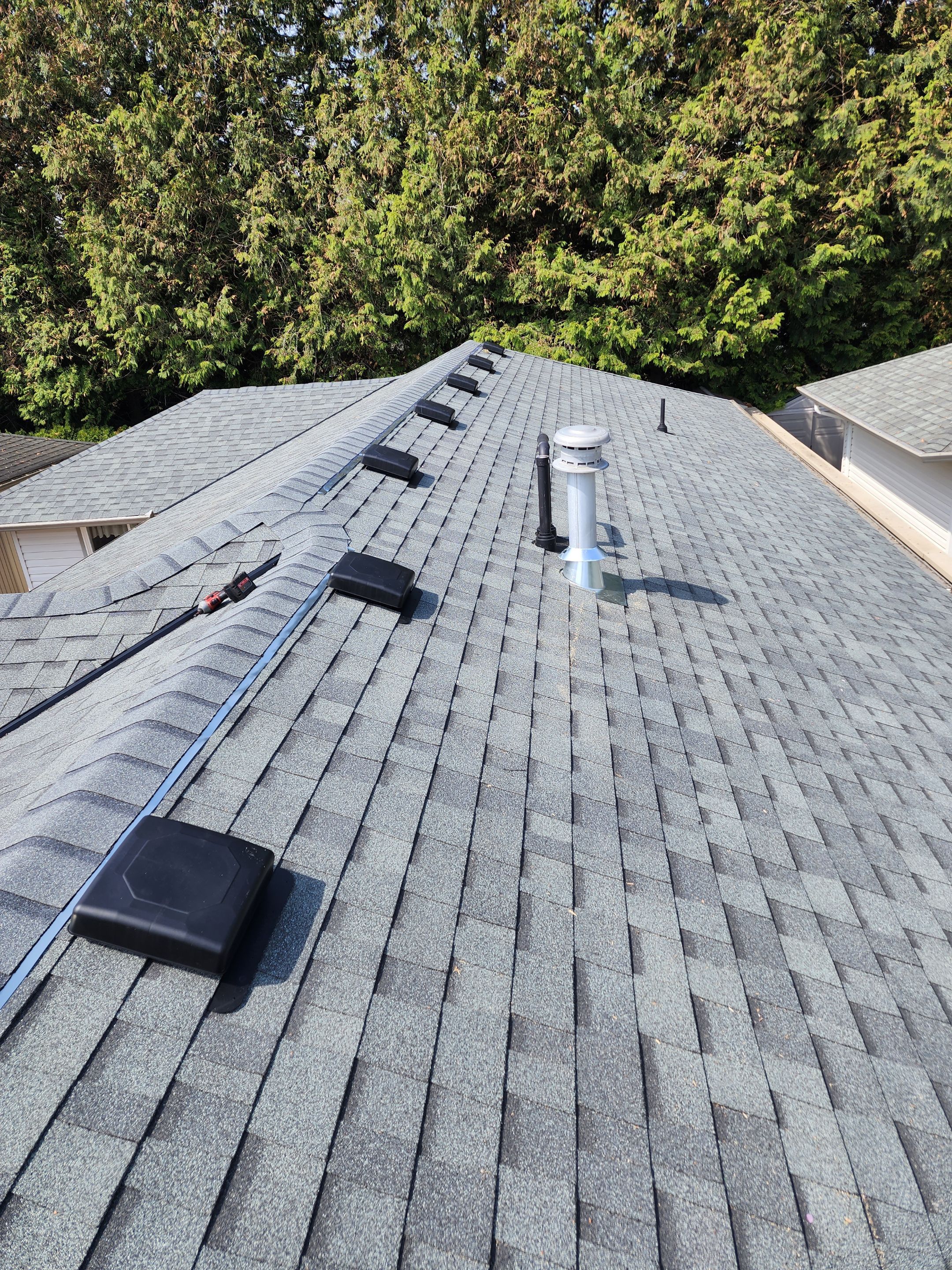 Residential ReRoofing Installation using OC Estate Gray Shingles by Top Notch Roofing Inc