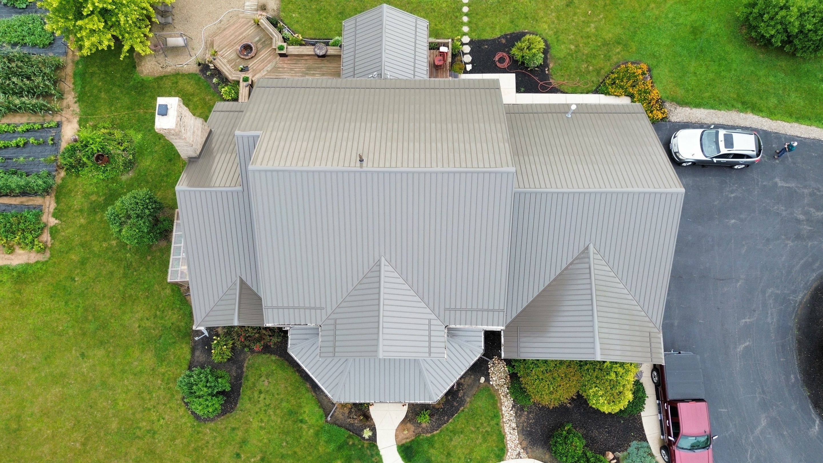 Residential Roofing Installation using Performance Panel Metal - Burnished Slate by RoofX 
