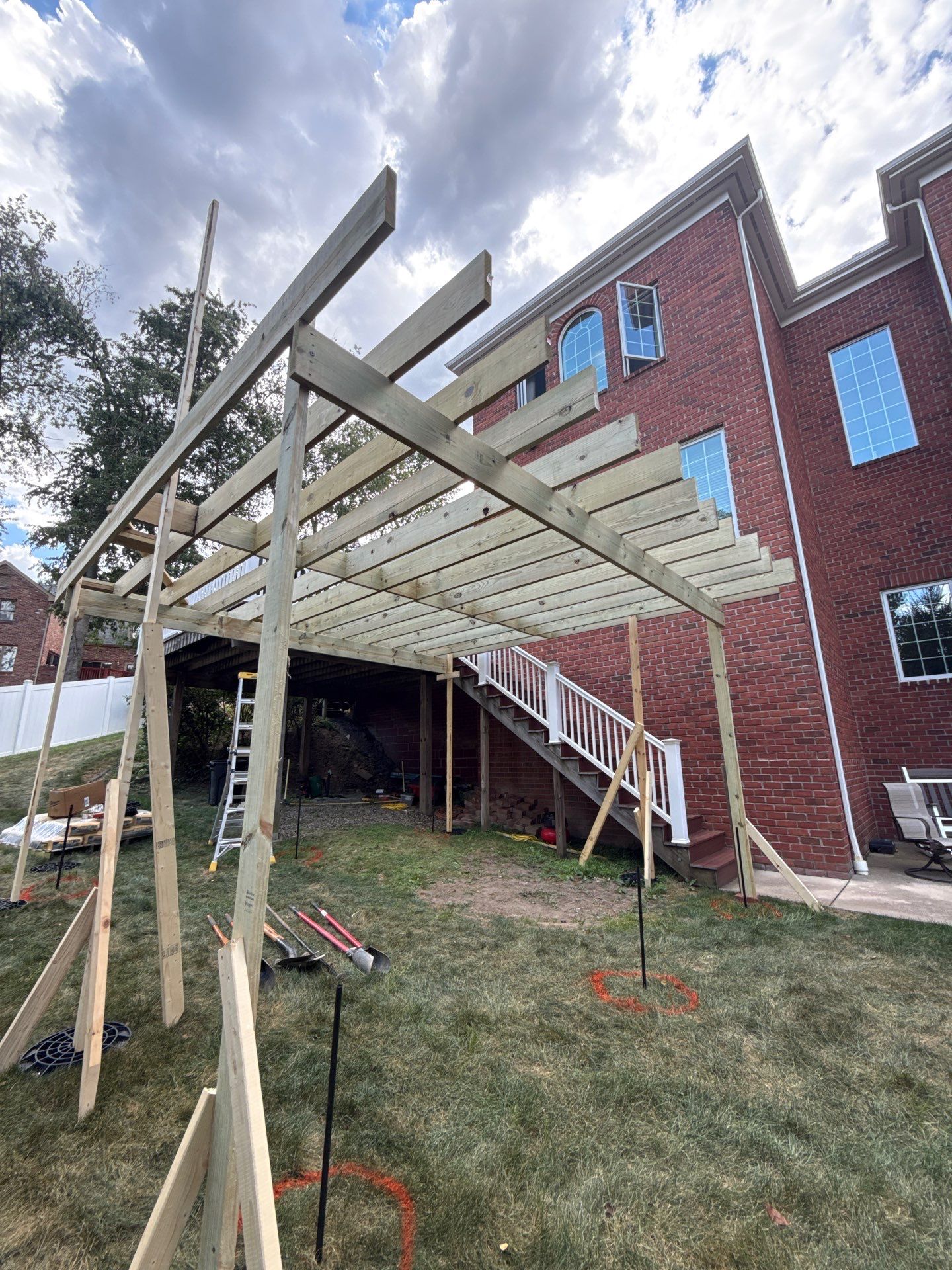 Deck extension  by Cousins Roofing Siding & Decks