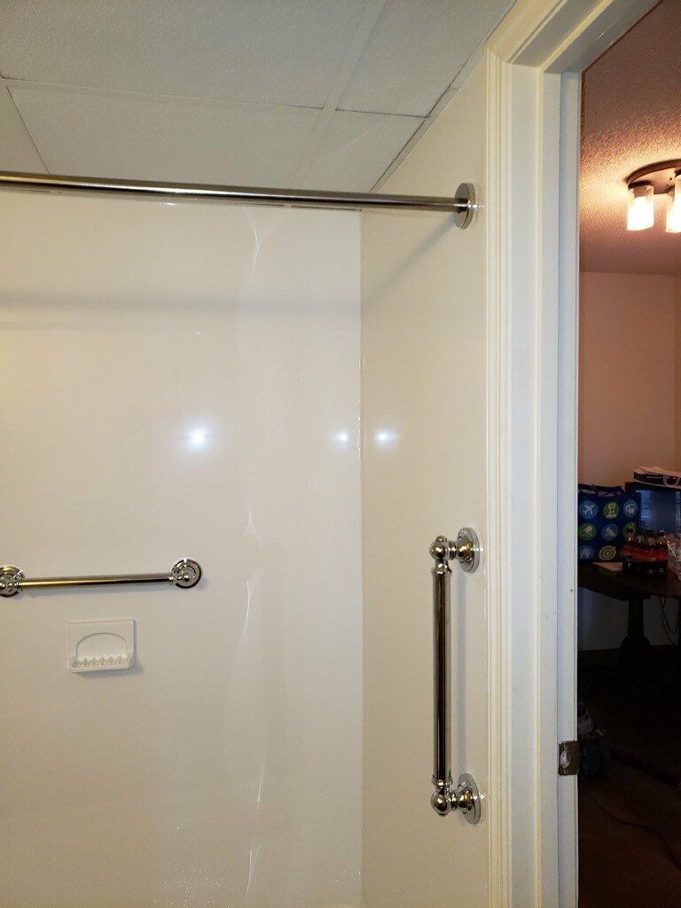 Tub to Shower Conversion using BCI Acrylic Shower System by Secure Construction Company Inc