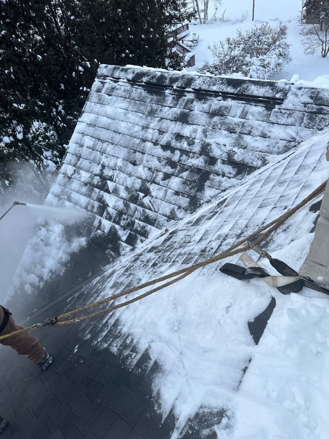 Roof Snow And Ice Dam Removal using Steamer by Total Restoration Services