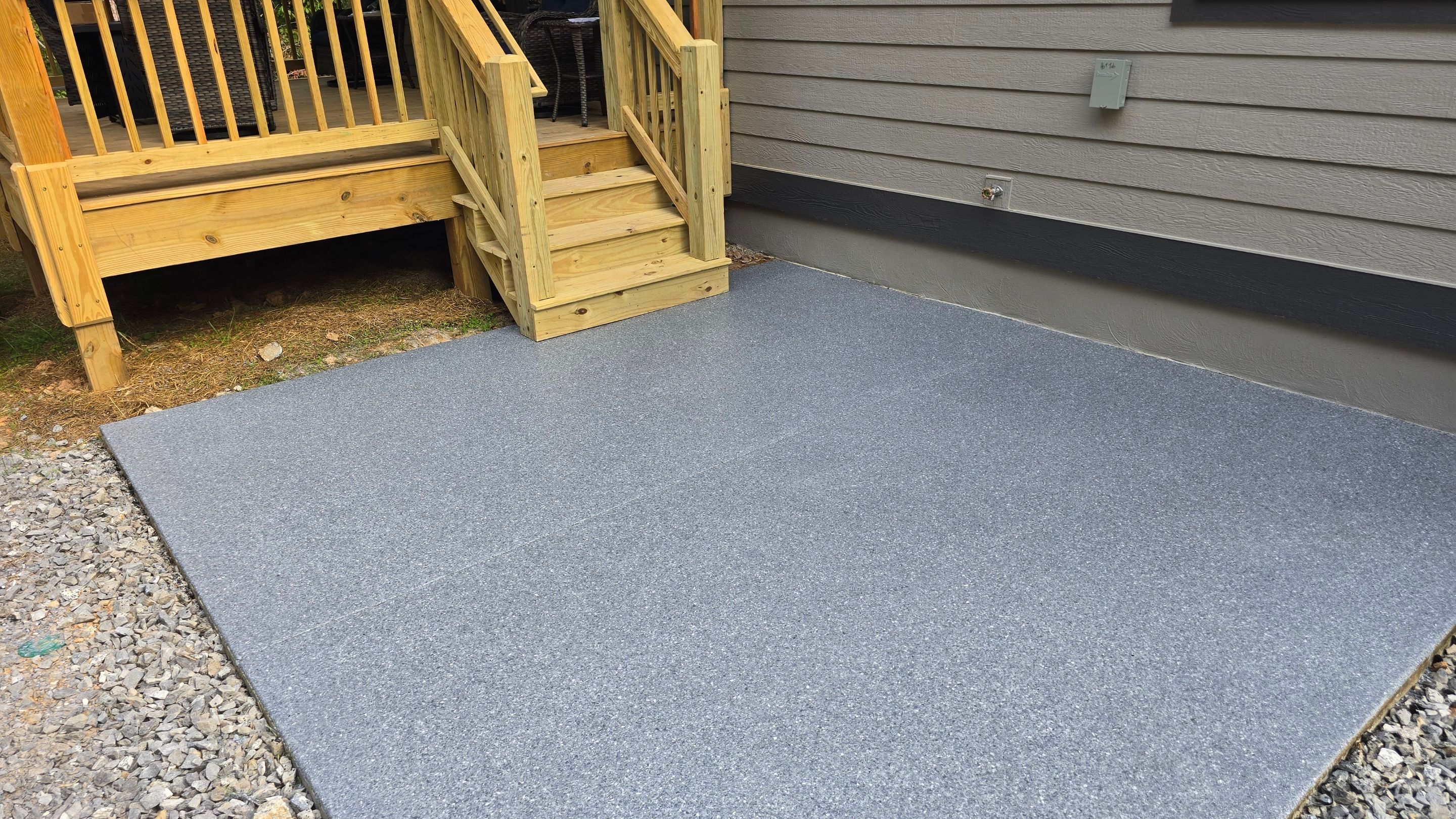 Patio Using Basalt & Garage Using Gravel by Elite Floor Solutions