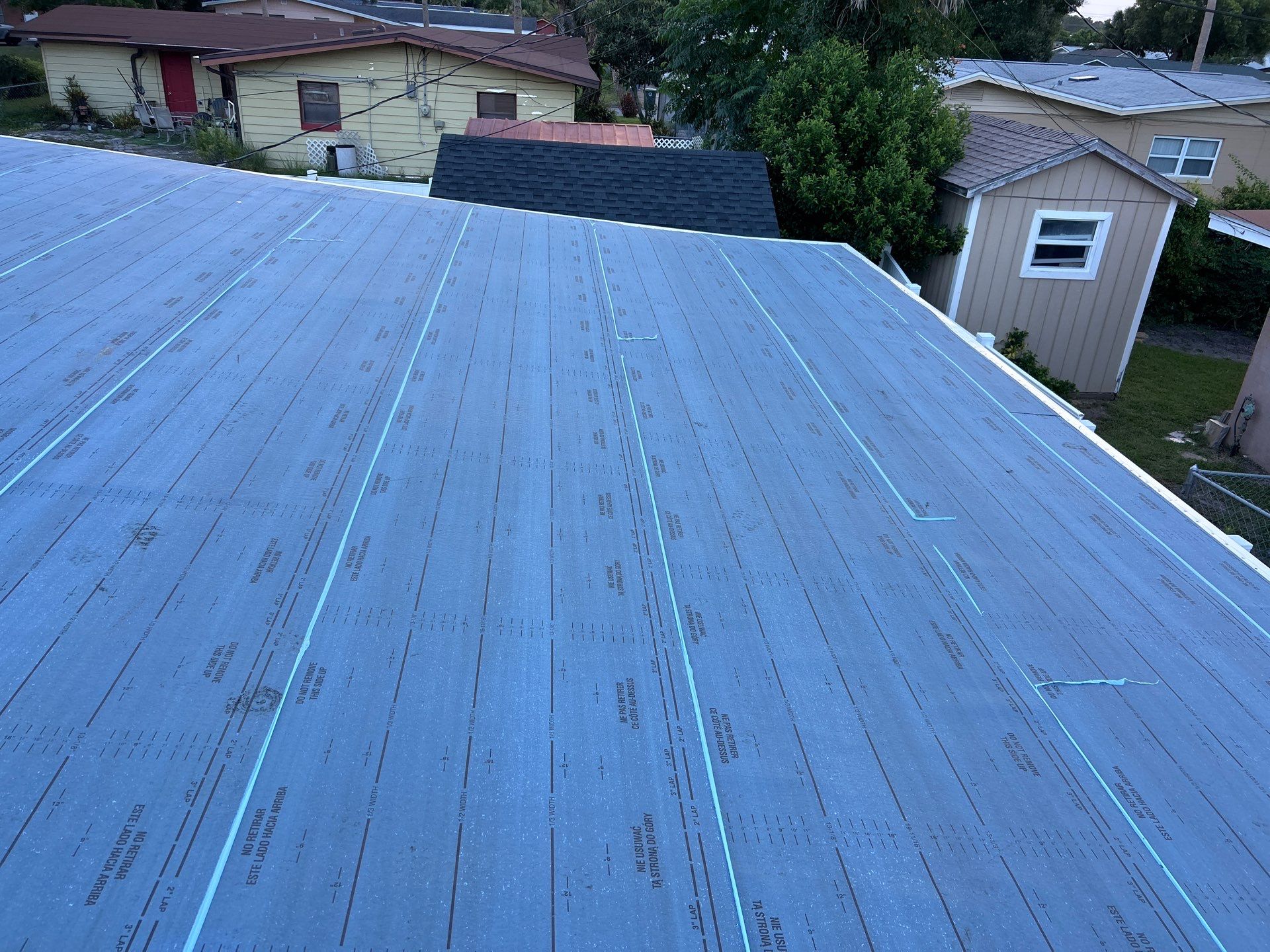 Colonial Slate Modified Bitumen Flat Roof Replacement in Daytona Beach by Pinnacle Roofing Group