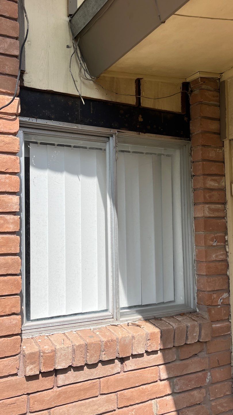 Windows in Brick with a Bay Window by Bayfront Roofing and Construction