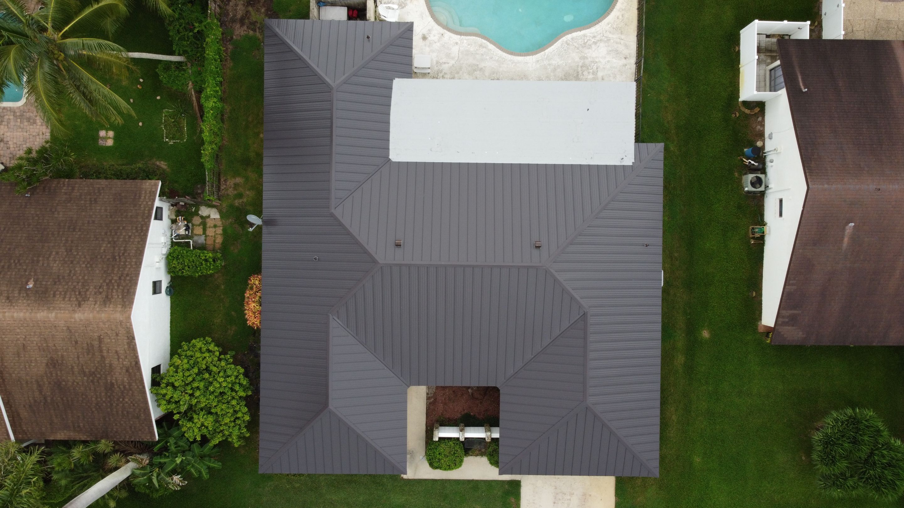 Residential Roofing Installation using 1" Nail strip metal roof by BLUES BROTHERS ROOFING