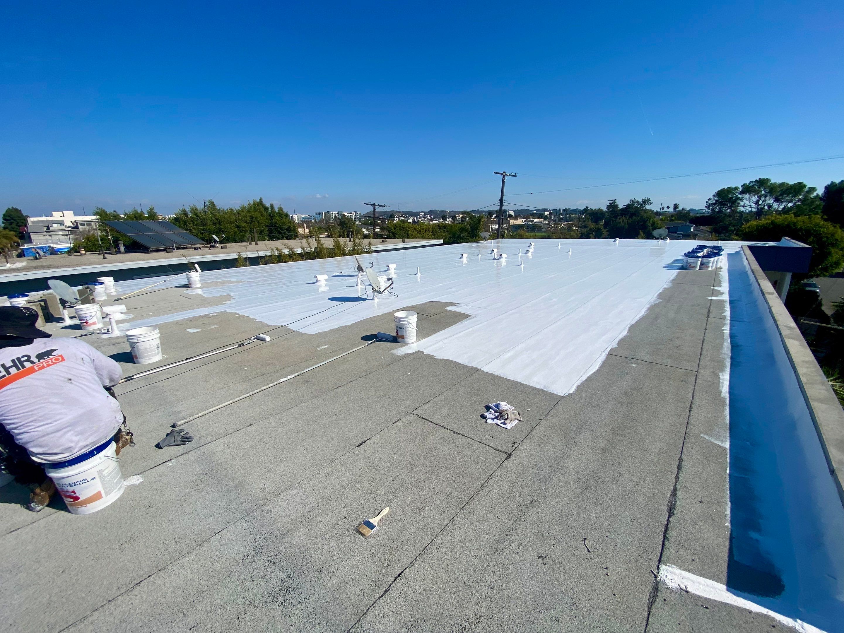 Apartment Building - Silicone Installation using ASC's Silicone Membrane by Hull Brothers Roofing