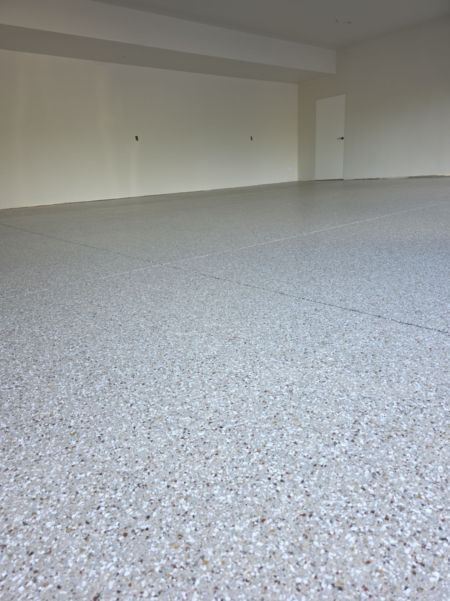 Garage Transformation using Pebble Beach by Croc Coatings, LLC