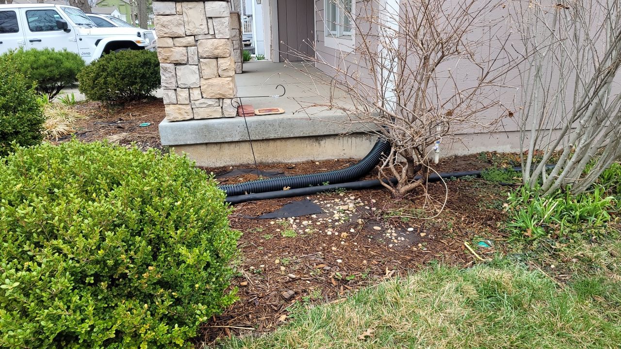 Drainage and Downspout Installation by LAND ESCAPES LLC