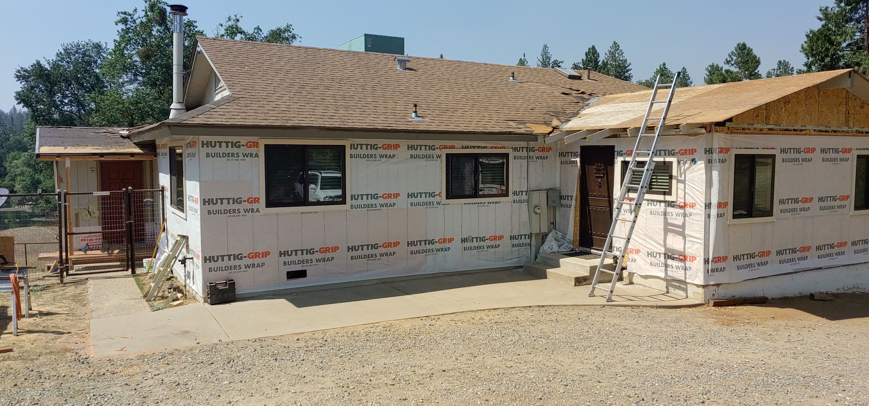 Residential Roofing Installation using Standing seam metal roofing system by Straight Edge Roofing Inc