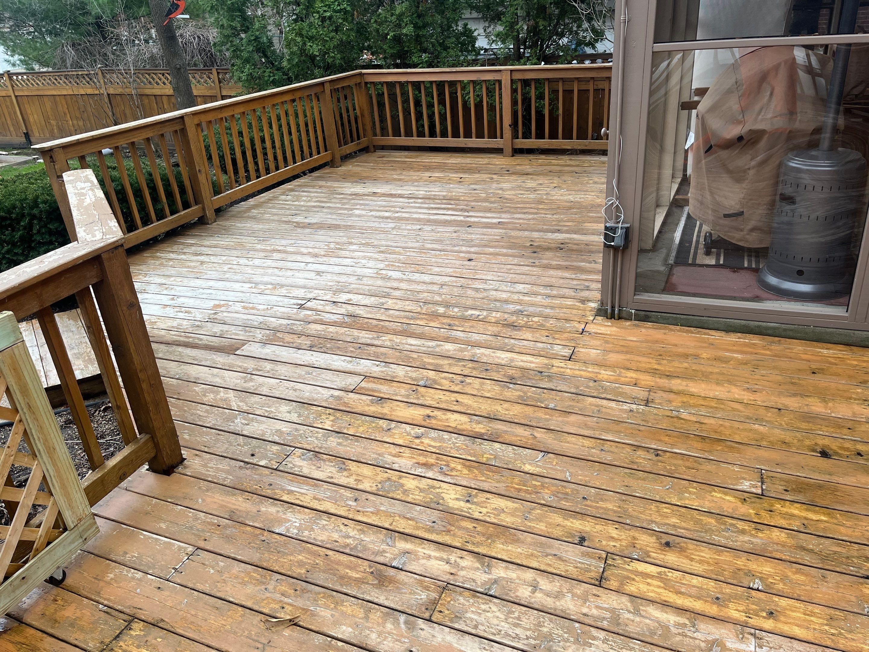 Wood cleaning and staining using Armstrong cloark oil stain by Northern Power Washing LLC.