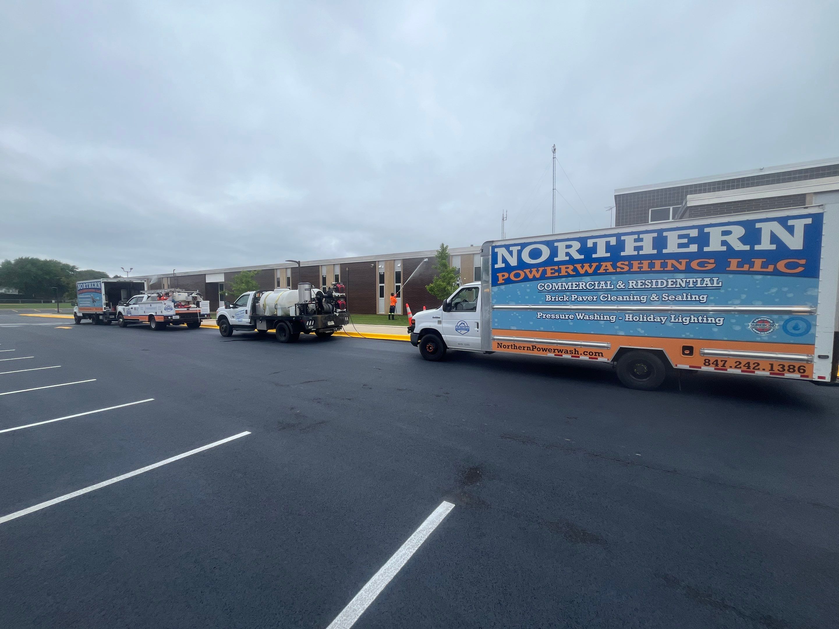 commercial pressure washing using Algaecide, soft wash soap by Northern Power Washing LLC.