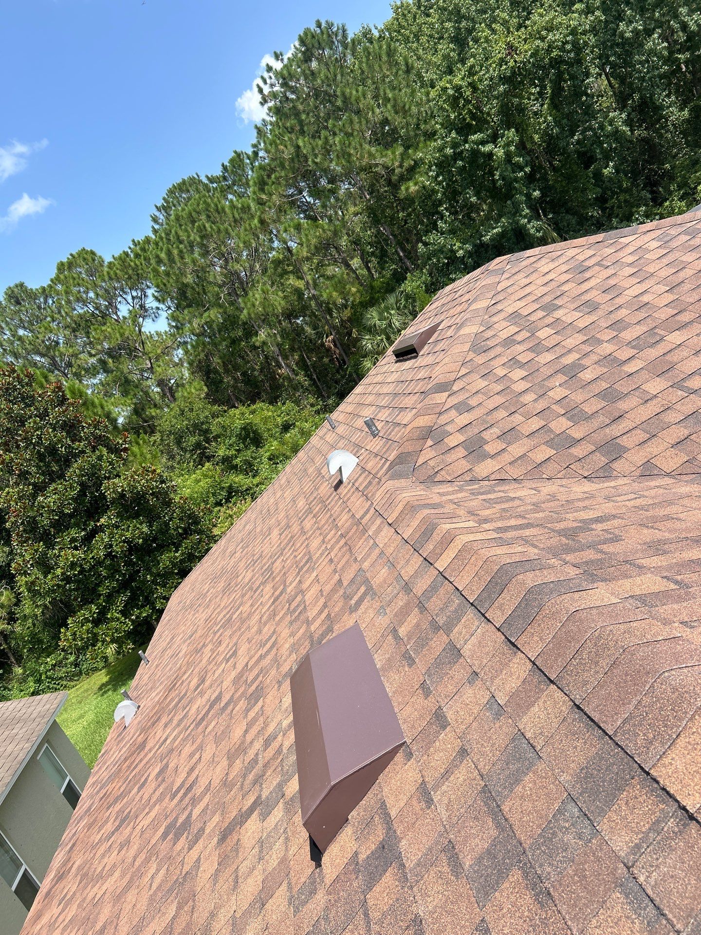 Complete Residential Roof Replacement in Port Orange Featuring Burnt Hickory Shingles by Pinnacle Roofing Group