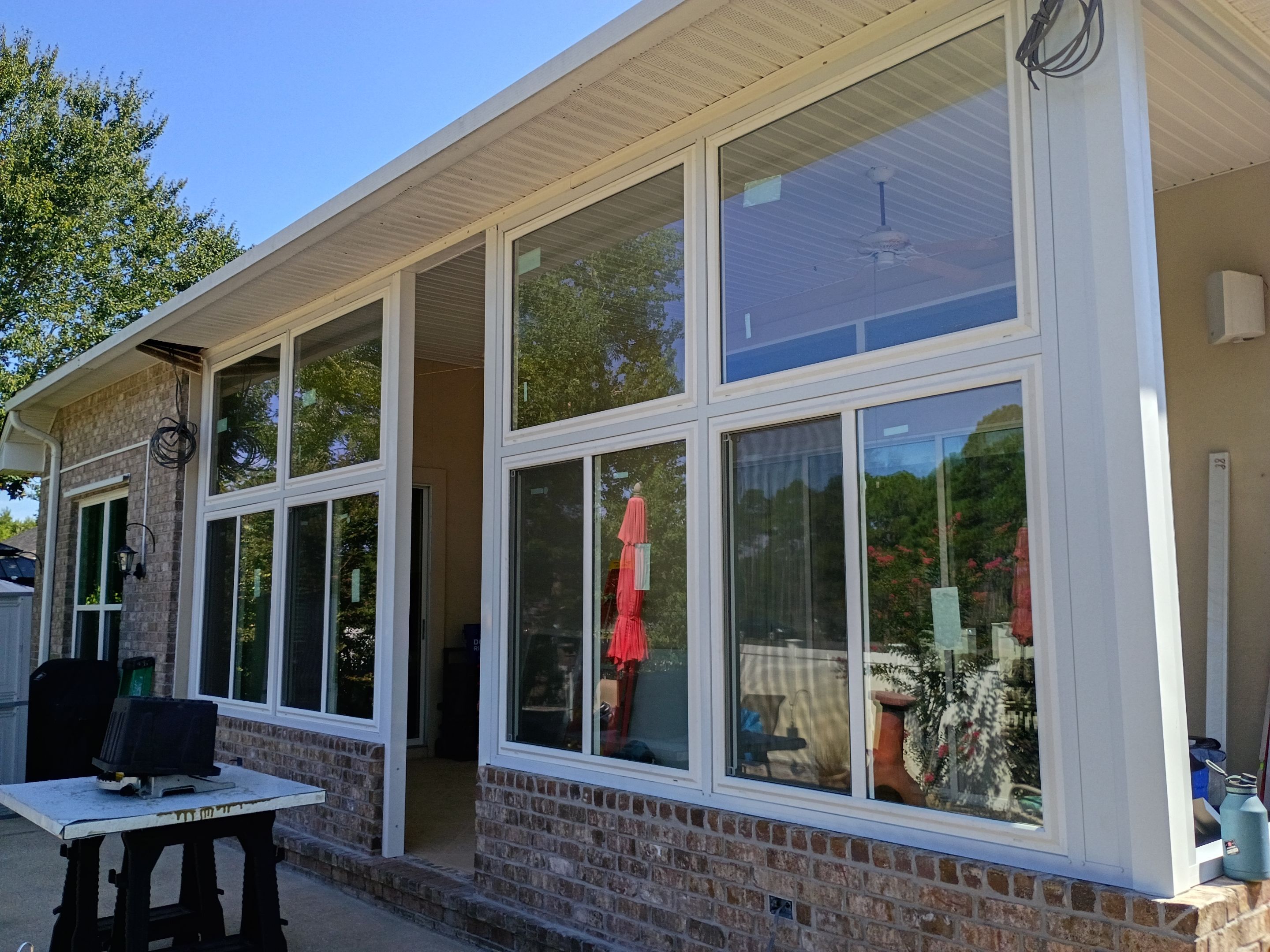 Screen Room Conversion to Glass Under  by Titan Sunrooms