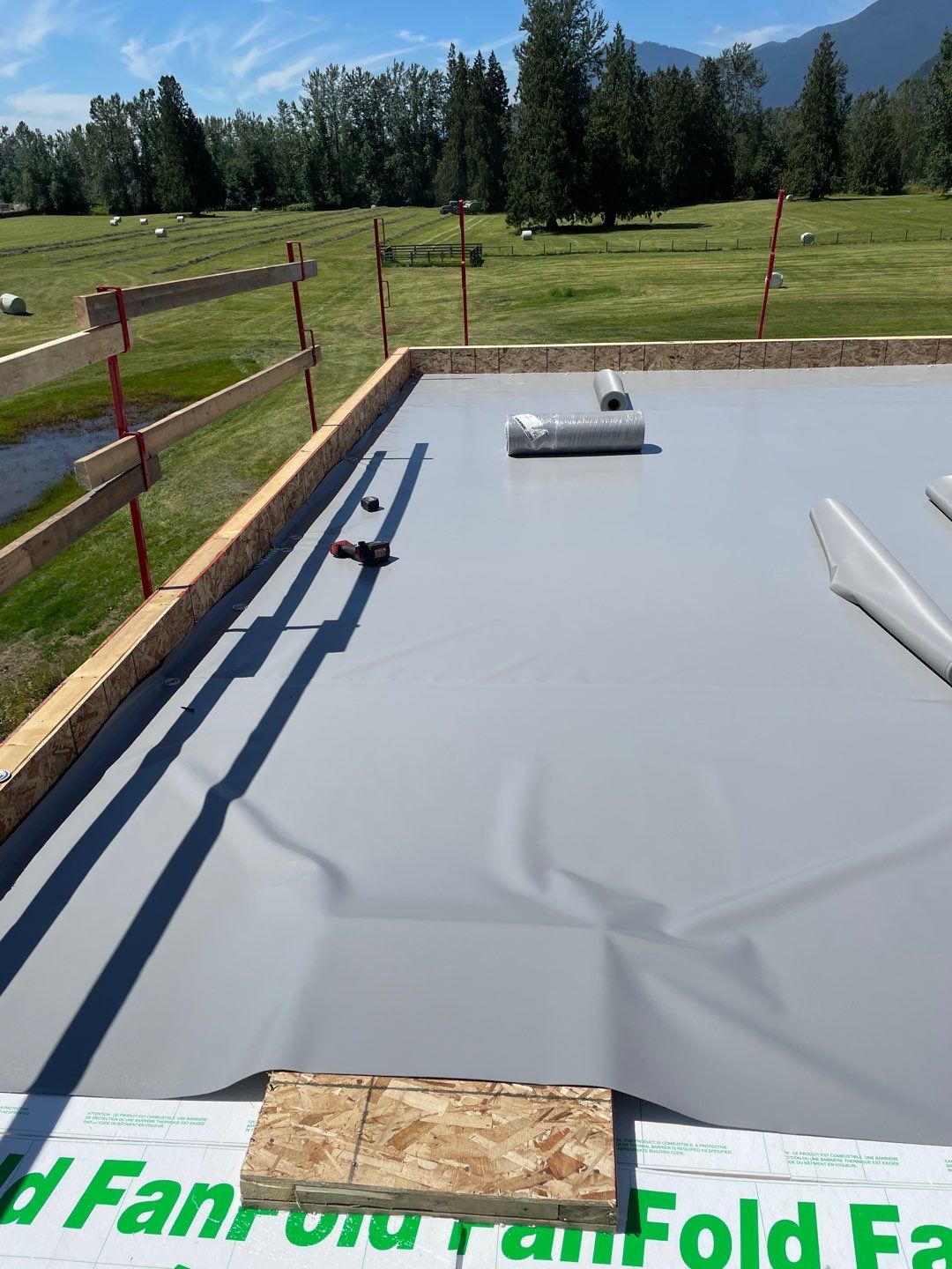 Residential Roofing Installation using multiple products by Top Notch Roofing Inc