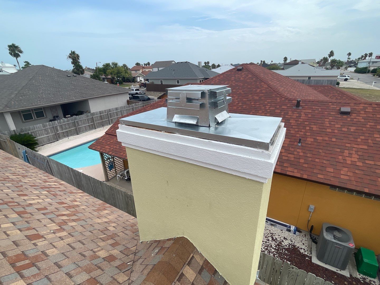 Residential Roofing Repair - Replacing Chimney Cap by Lighthouse Roofing