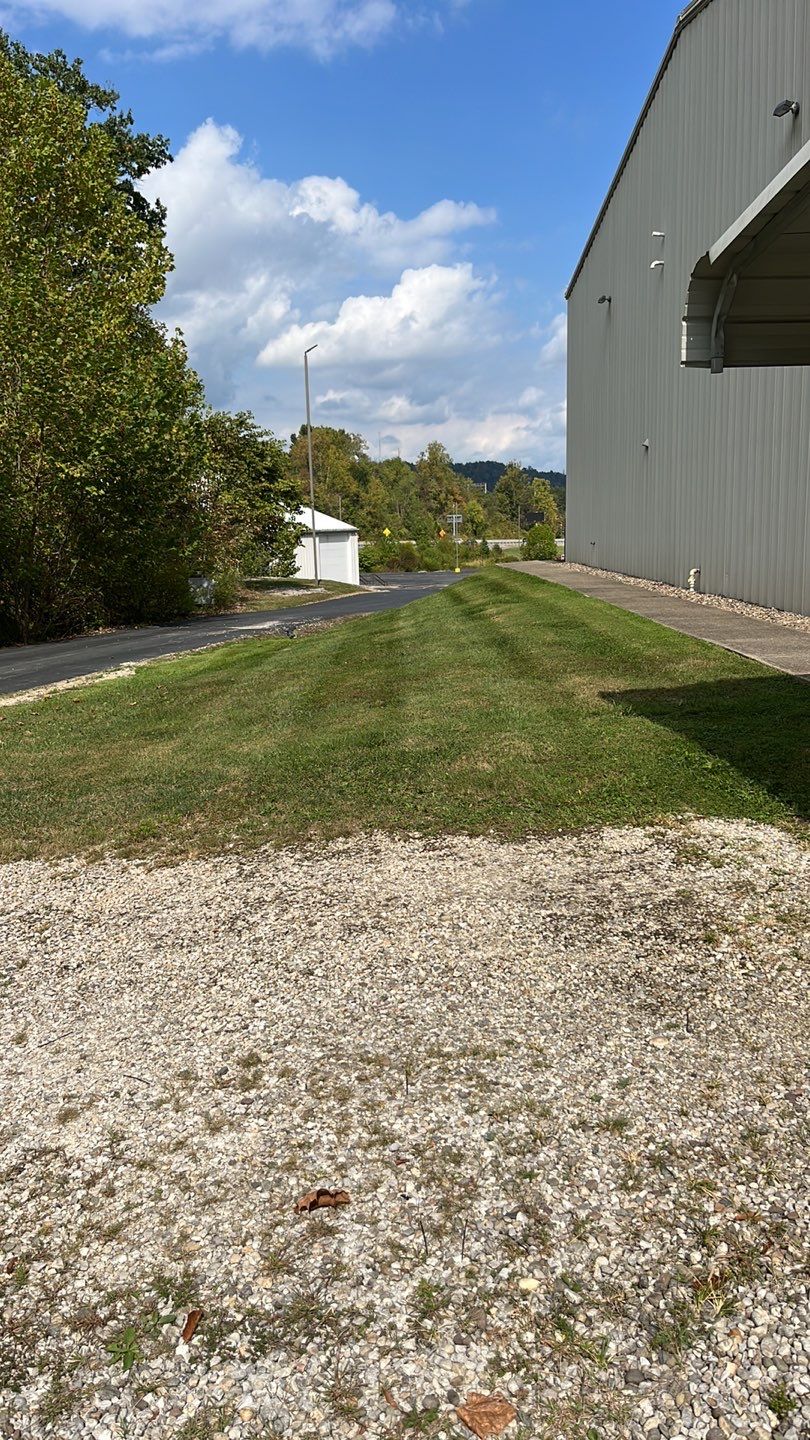 Lawn Mowing using Lawn mower by GrassBusters, Inc.
