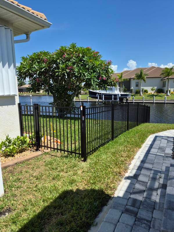 Custom Black Aluminum Fence Enclosure for Punta Gorda Waterfront Property by True Fence LLC
