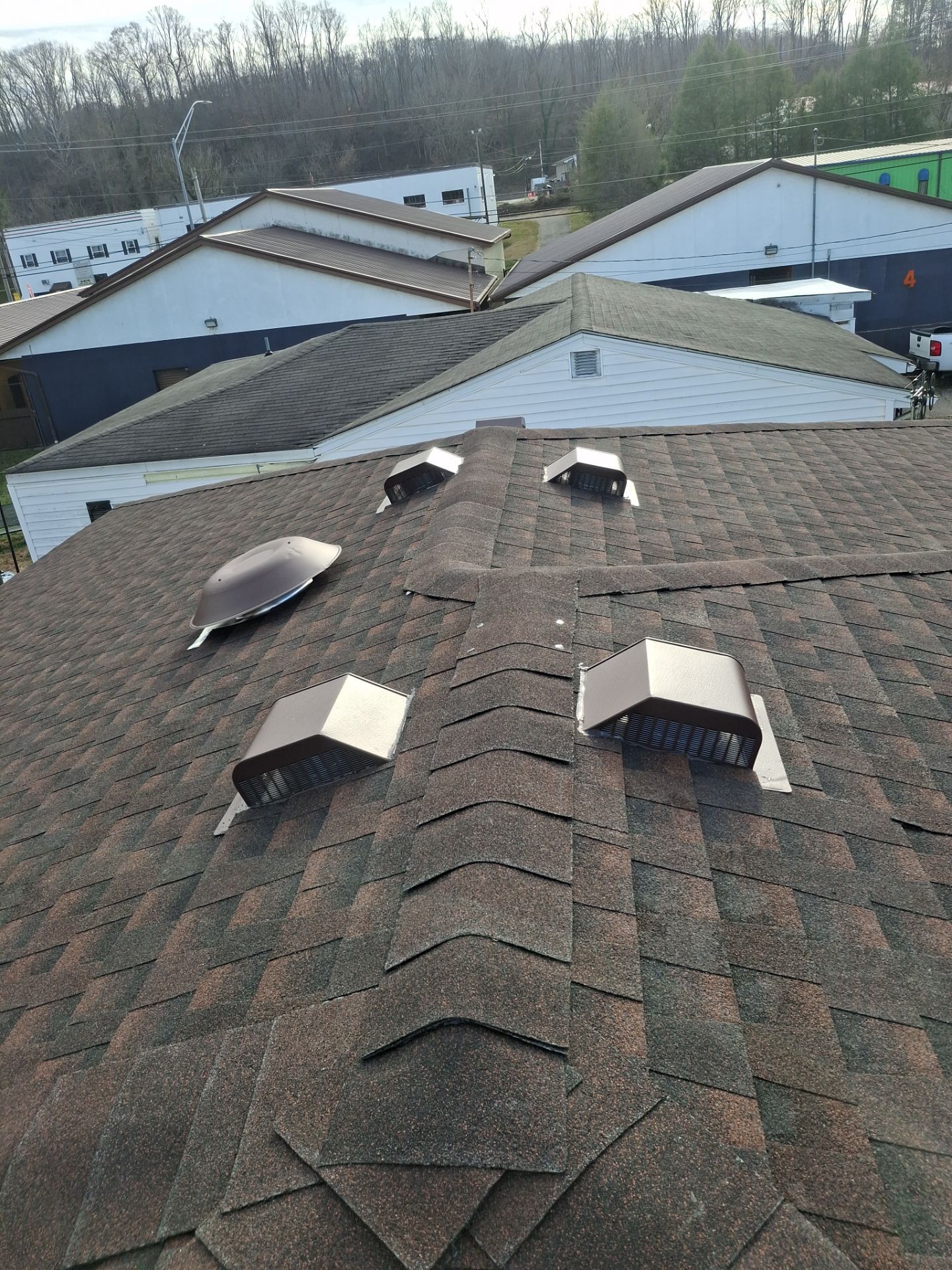 Residential Roofing Installation using GAF TImberline HDZ Hickory by Rainstoppers Roofing