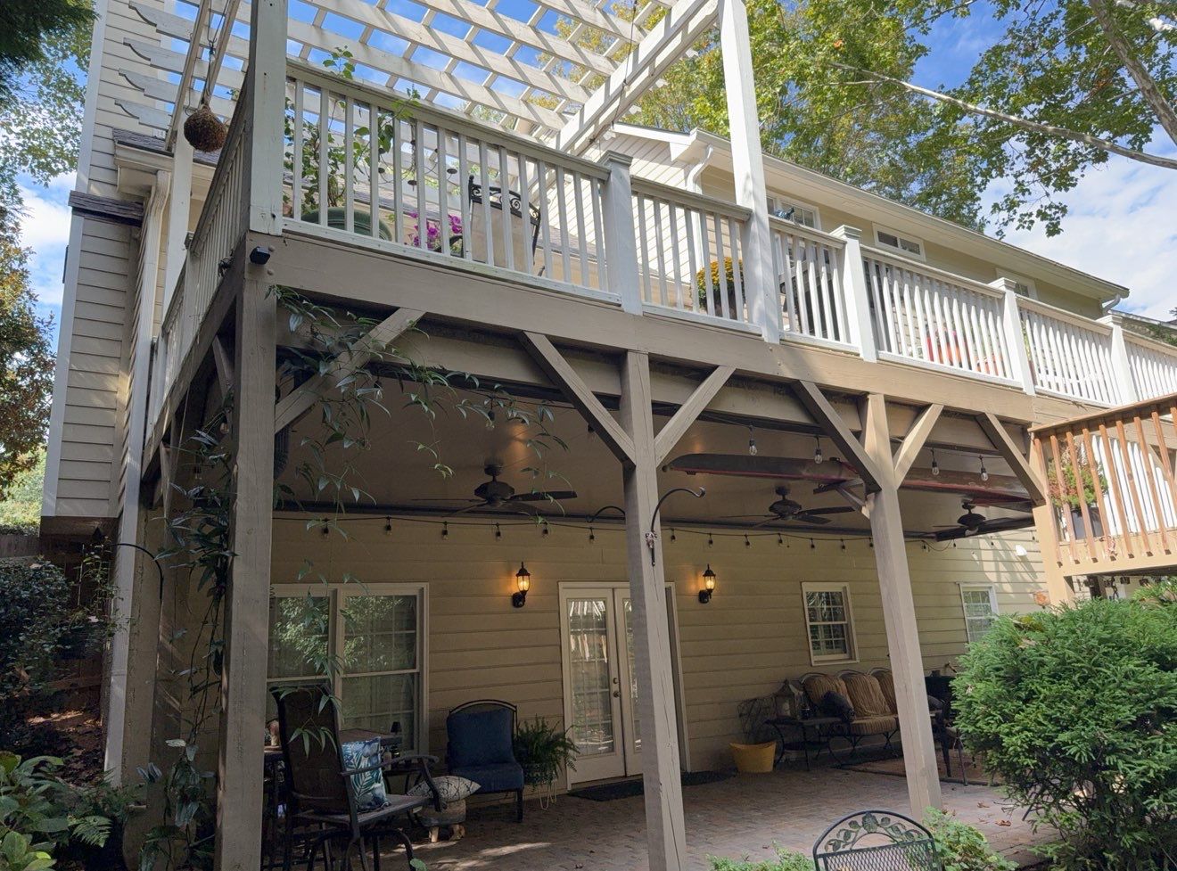Deck Resurface and Screened-In Porch Build with Timbertech LED Lantern Post Cap Lights by Nelson Exteriors