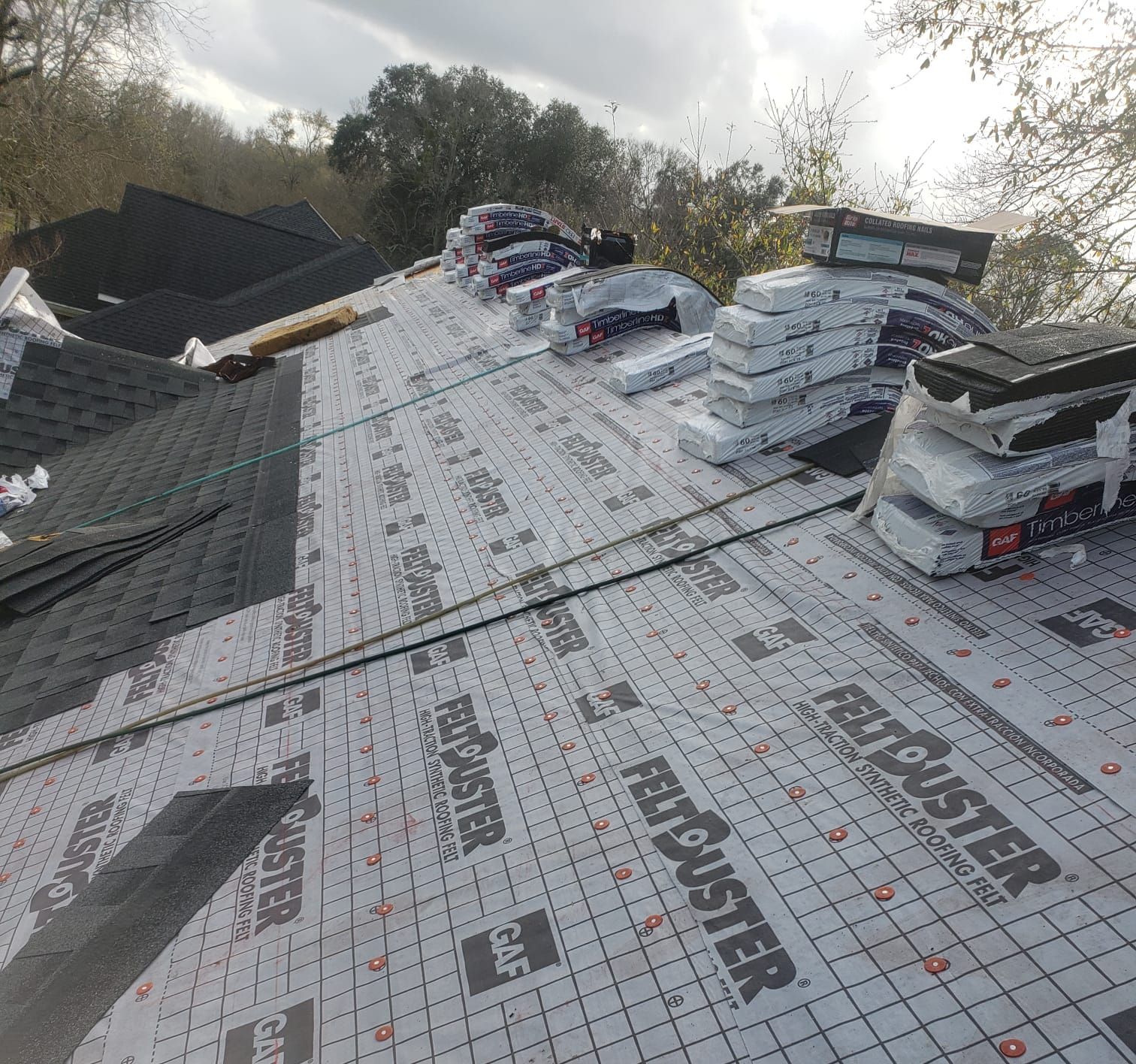 Residential Roofing Installation using Roof Replacement by American Roofing & Construction LLC