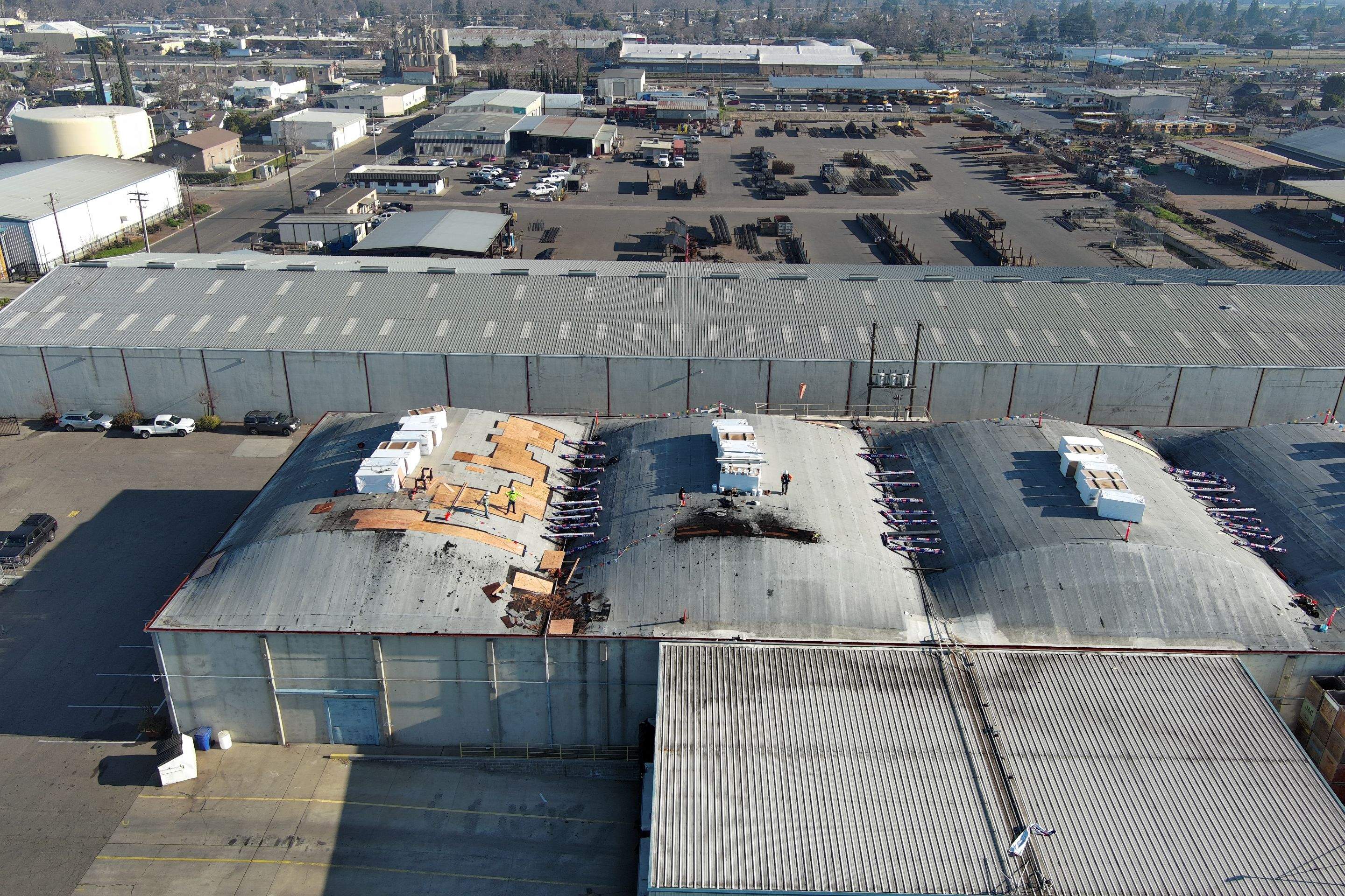 TPO single-ply roofing system using GAF Single-ply TPO 60 mil with 1.5 inch ISO board insulation by Straight Edge Roofing Inc