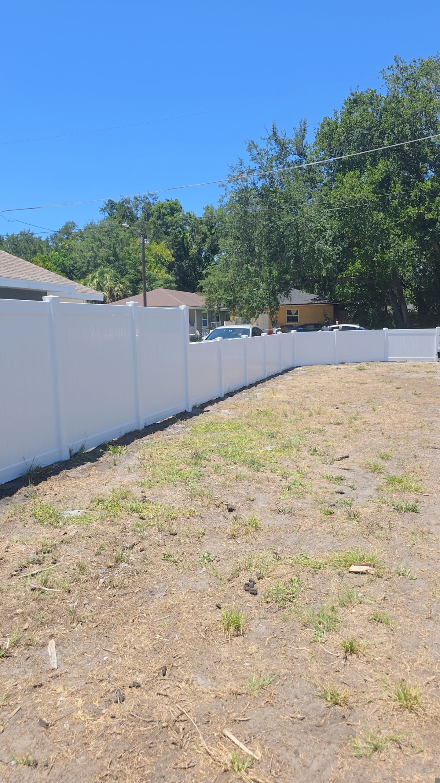 White Vinyl Privacy Fence and Gate Installation in Bradenton by True Fence LLC