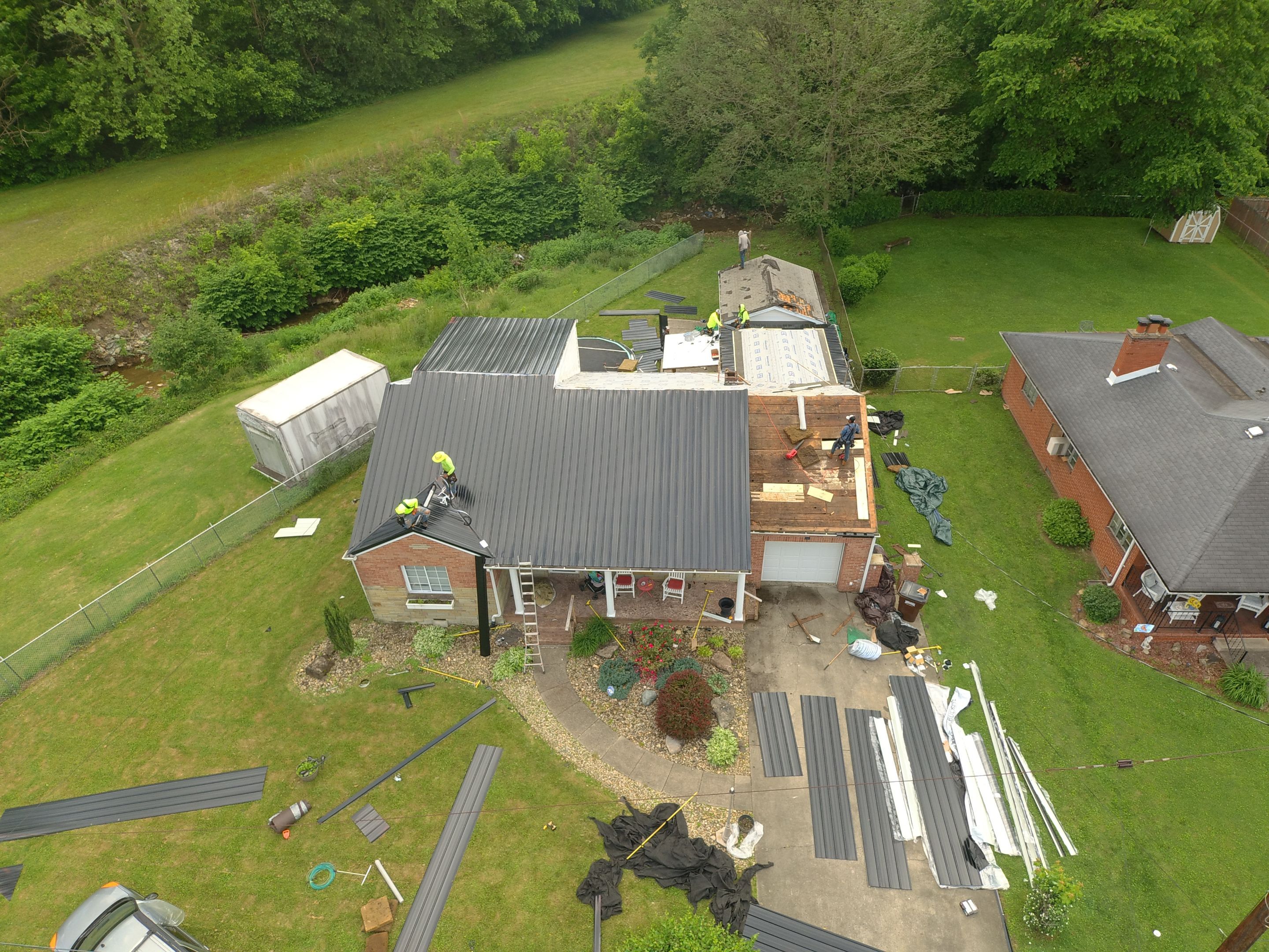 Residential Roofing Installation using Metal by Mr. Roofer