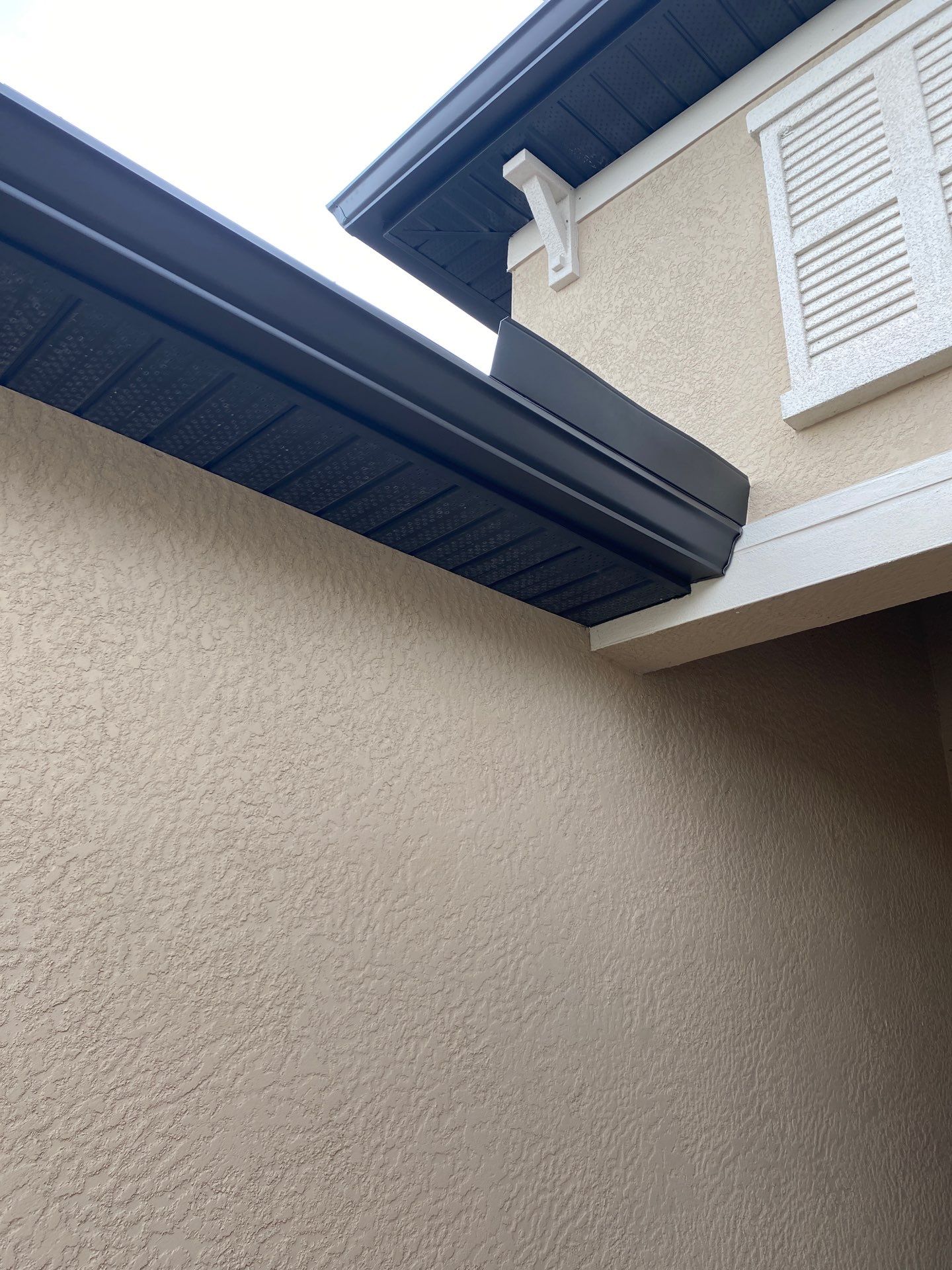 Brown Seamless Gutters for Homes in Fort Myers by Gutter Professors