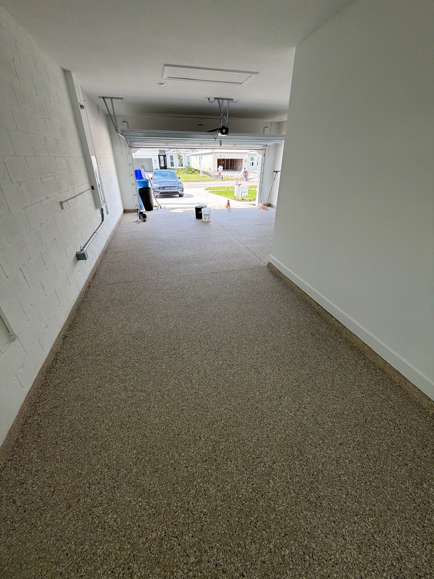 Custom Epoxy Floor Coating for Wesley Chapel Garage by Performance Floors & Coating