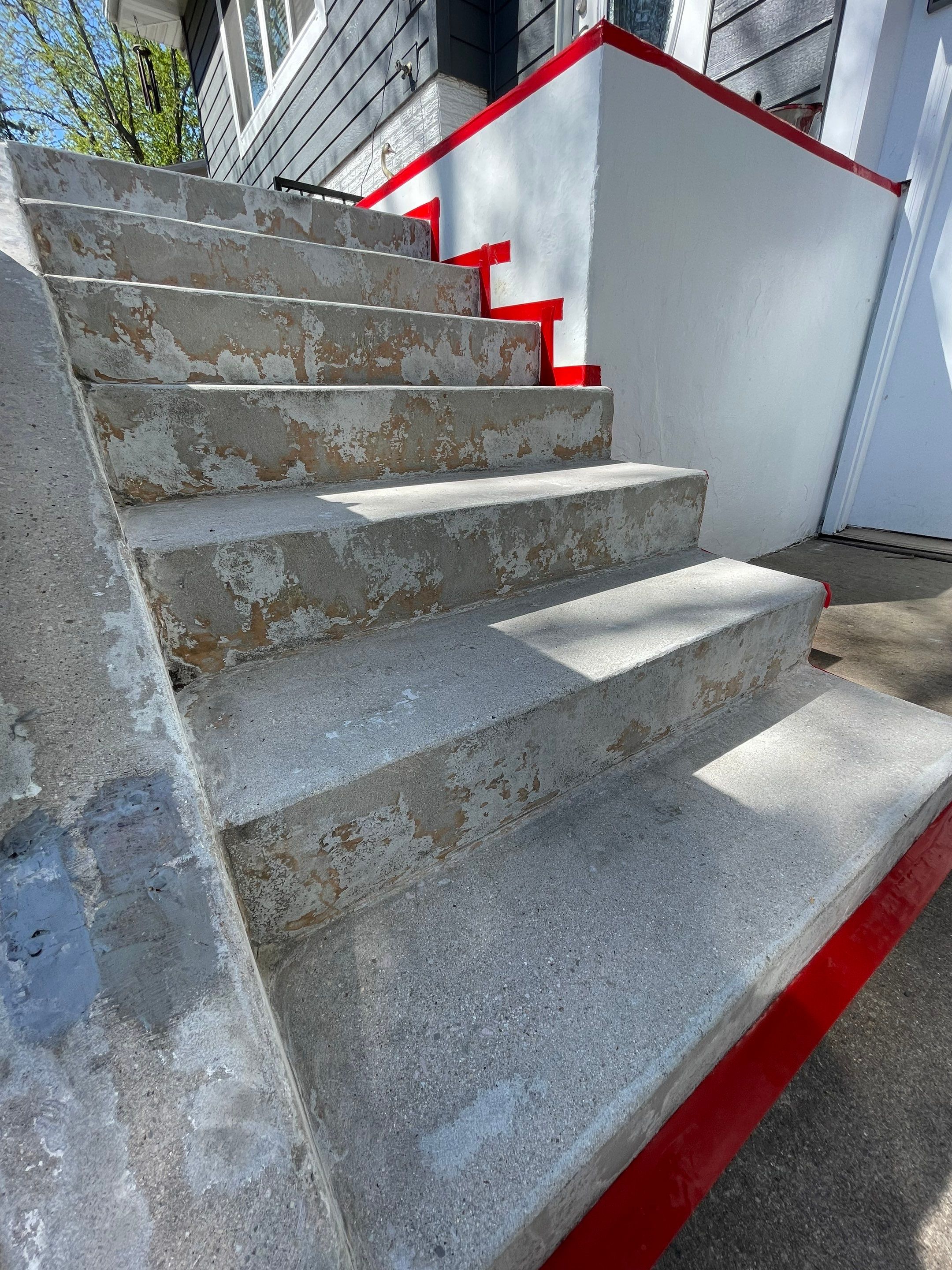 Grey Polyaspartic Porch and Stair Resurfacing in Sioux Falls by Select Painting, Coatings & Garage Cabinets