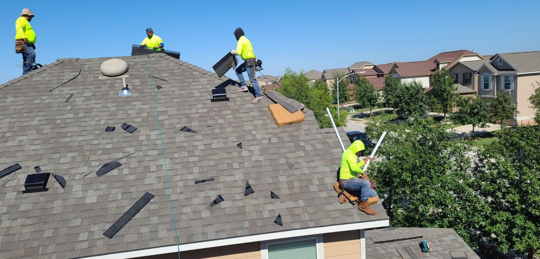 Hail Damage Restoration for Austin Two-Story Residential Home by Caliber Restoration LLC